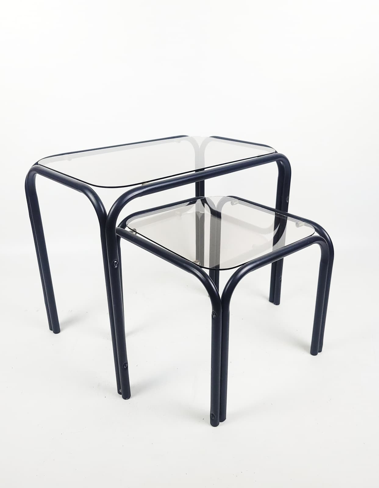 Set of two coffee tables, grey glass, black metal, 1980s.
