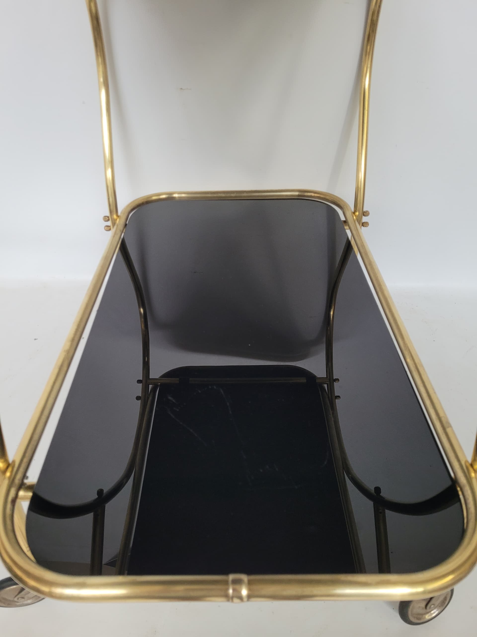 Bar cart, gold brass, black glass, 1950s. - 352956