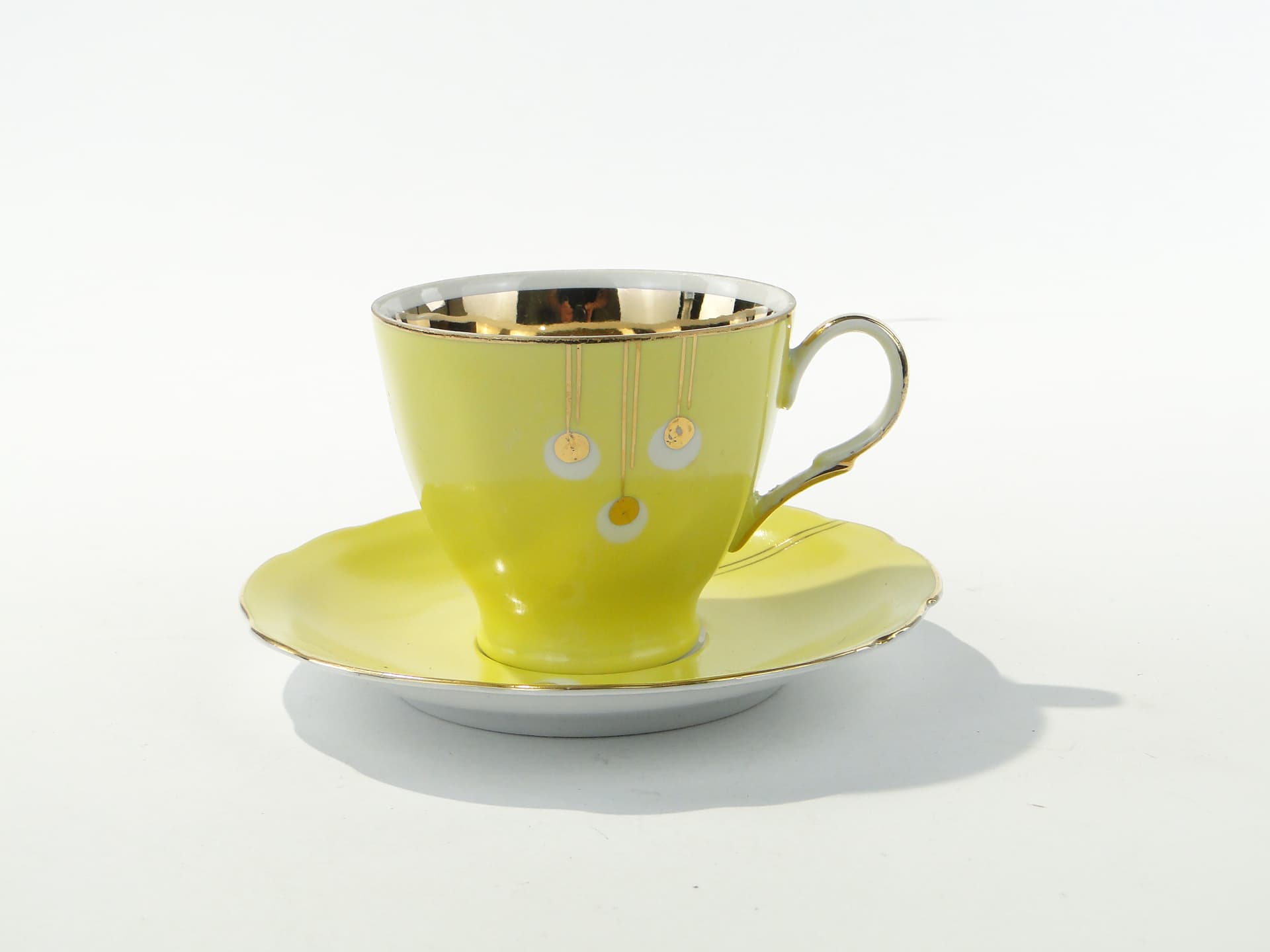 Coffee Cup Pawie Oczka, white yellow porcelain, gilded, by W. Potacki, Ćmielów, Poland, 1950s - 354669