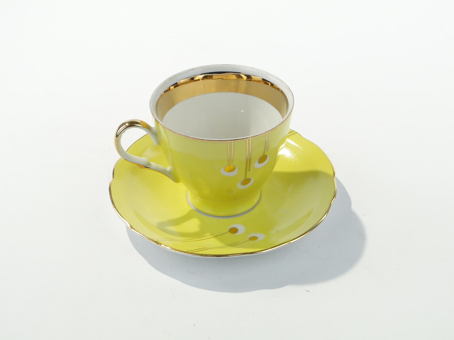 Coffee Cup Pawie Oczka, white yellow porcelain, gilded, by W. Potacki, Ćmielów, Poland, 1950s - 354670