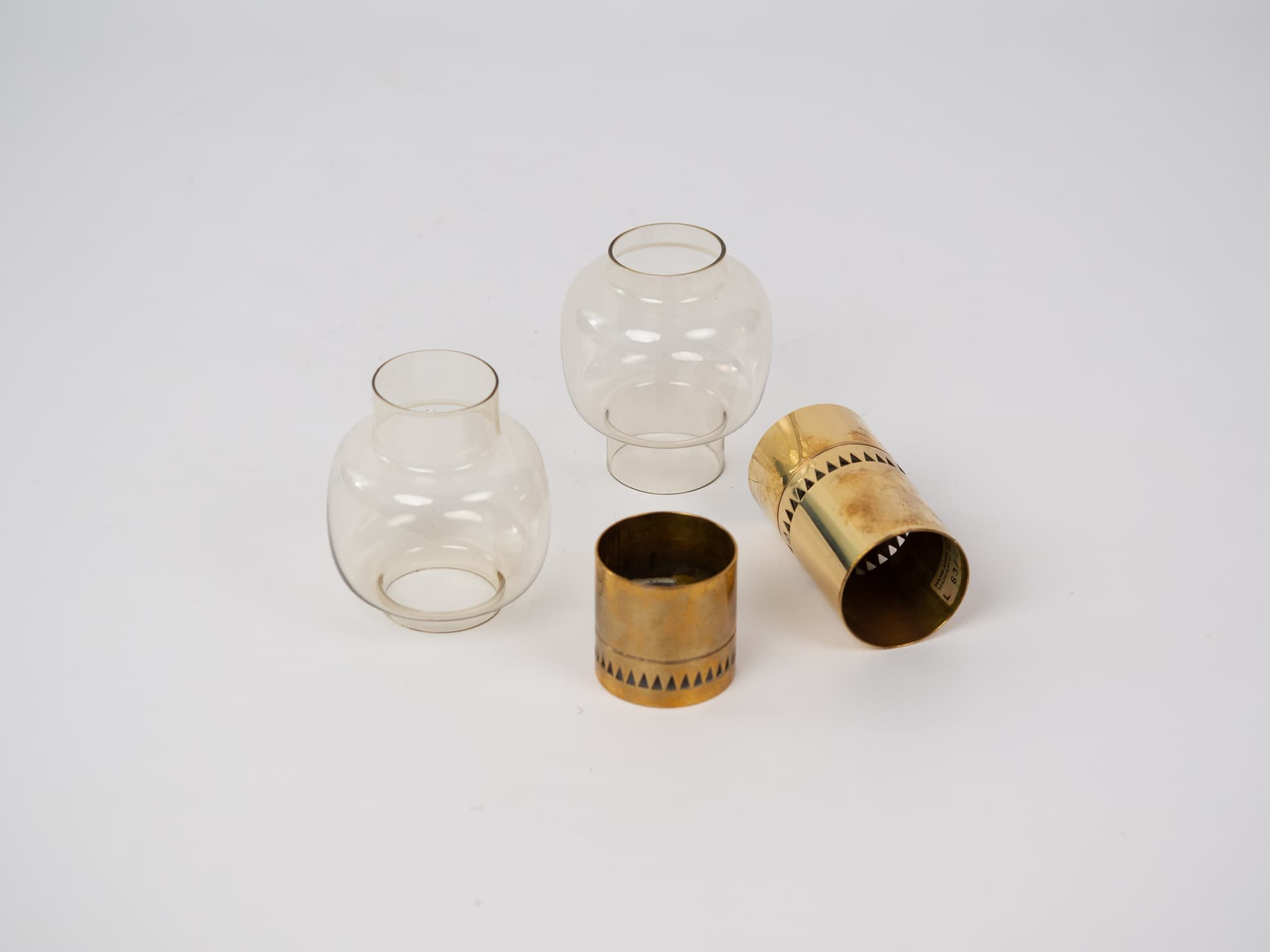 Set of four candle holders Lotta, transparent glass, gold brass, by H.-A. Jakobsson, Svegards Markaryd, Sweden, 1950s. - 355196