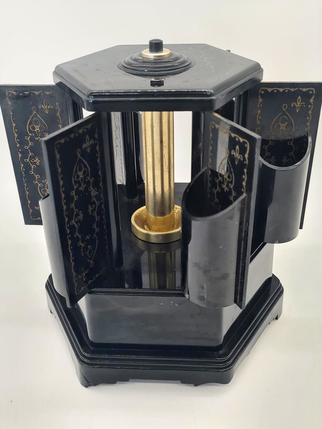 Cigarette dispenser with music box, black gold plastic, Selcol, England, 1960s. - 357209