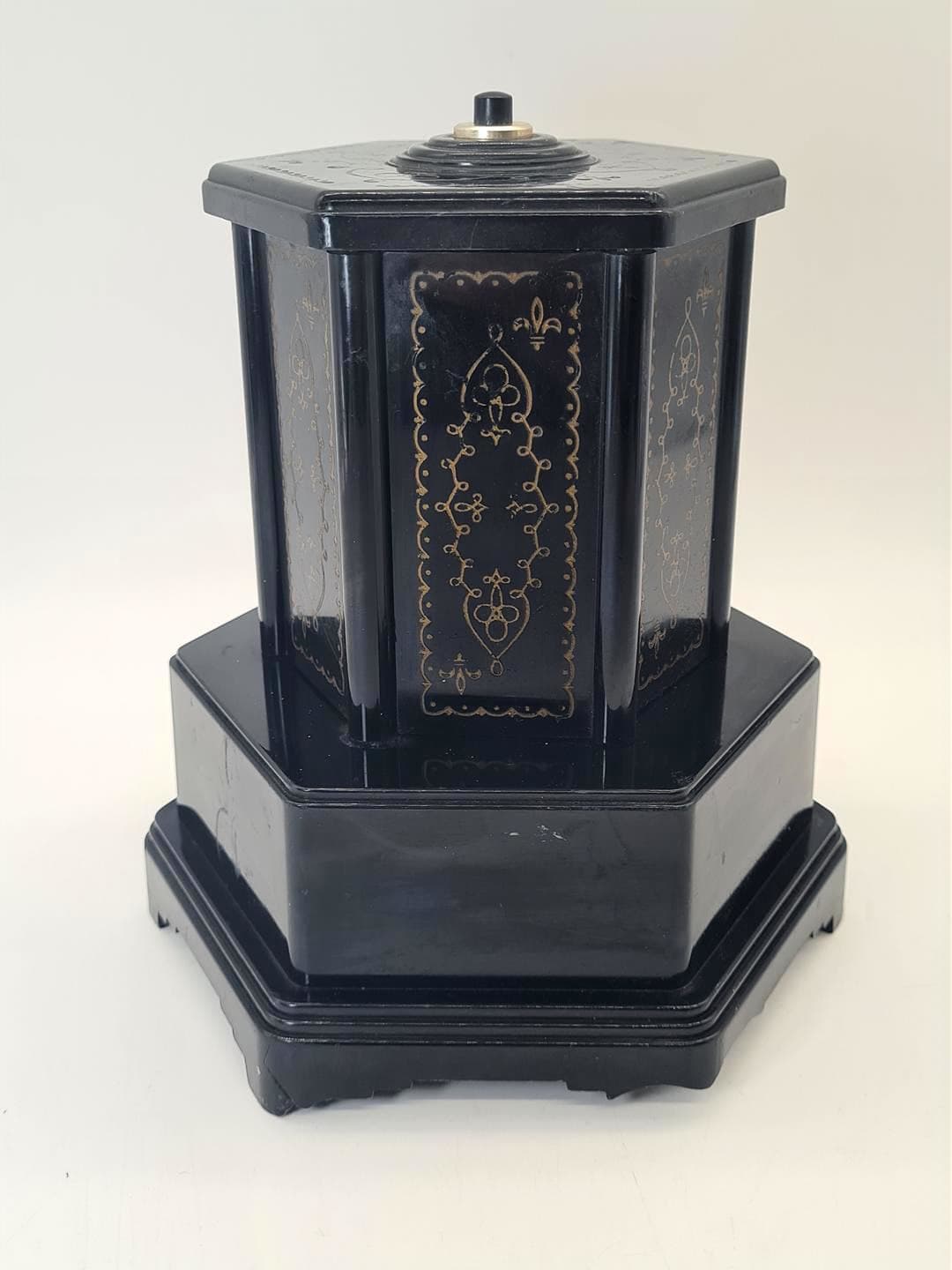 Cigarette dispenser with music box, black gold plastic, Selcol, England, 1960s. - 357211