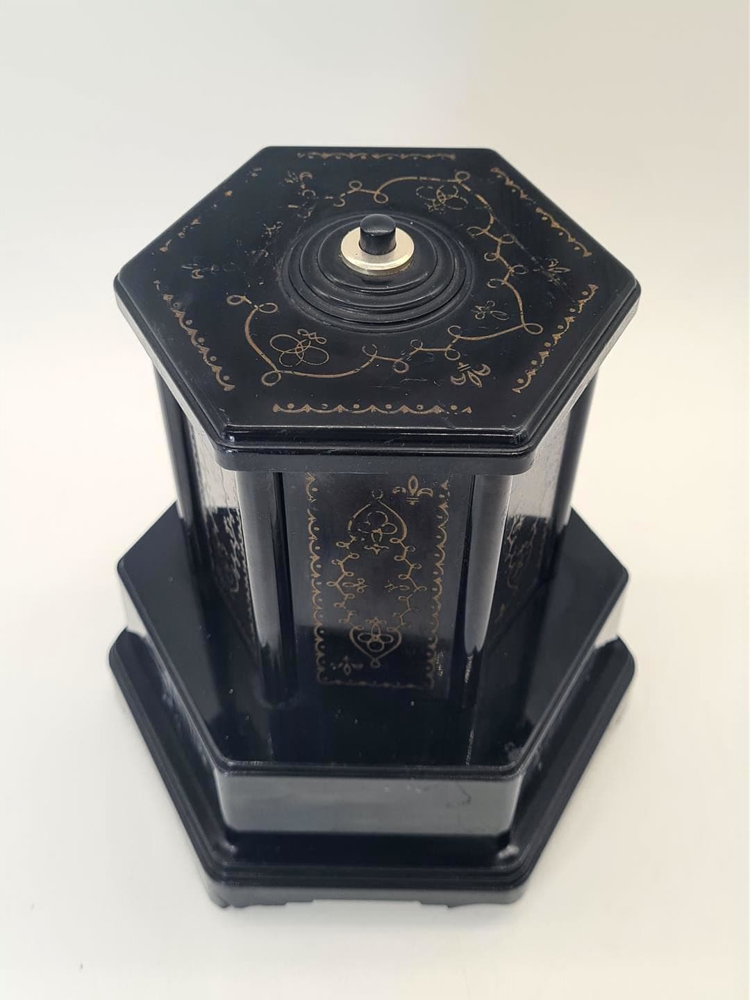Cigarette dispenser with music box, black gold plastic, Selcol, England, 1960s. - 357208