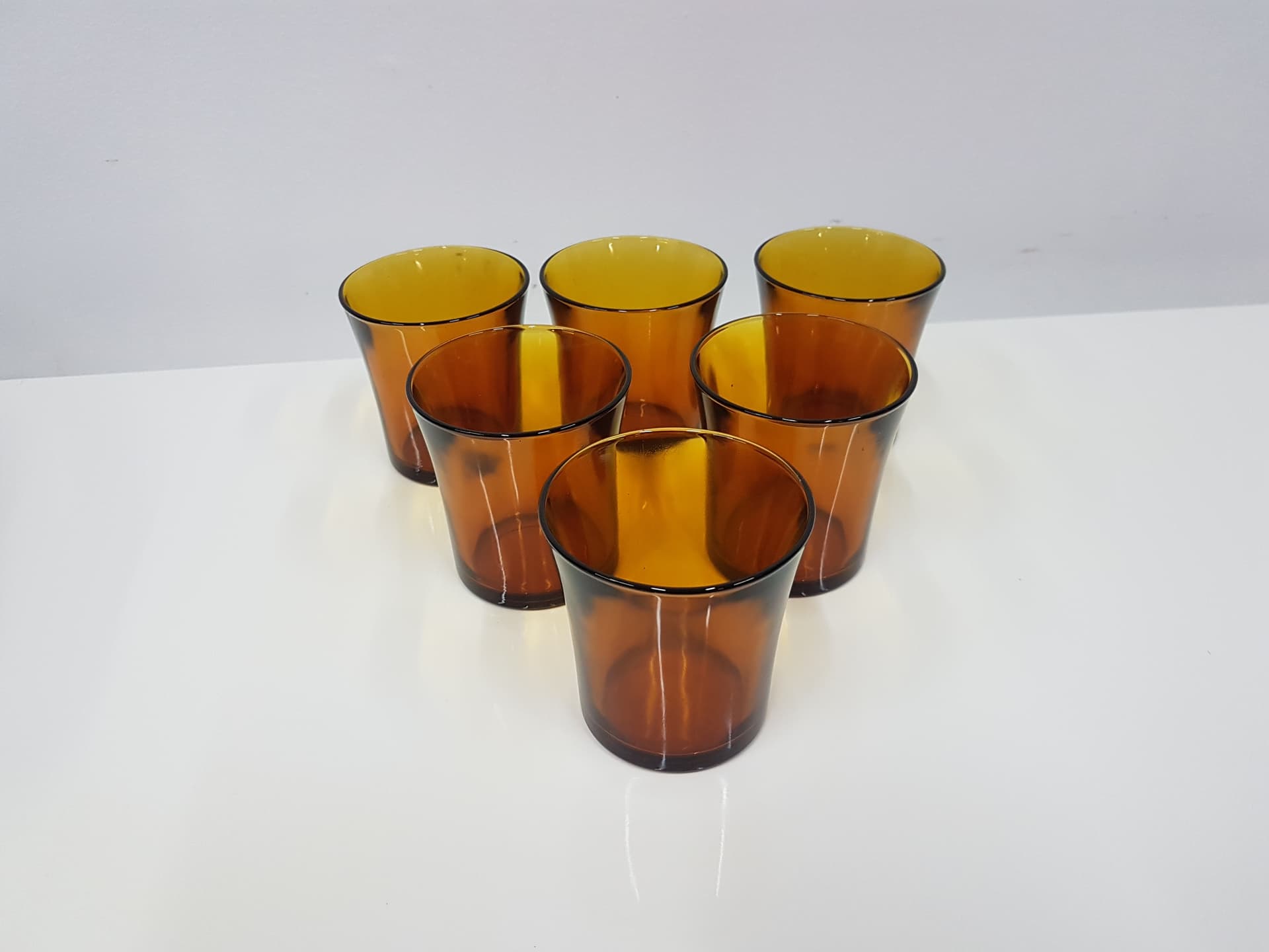 Set of six amber glasses, glass, Duralex, France, 1980s. - 360483