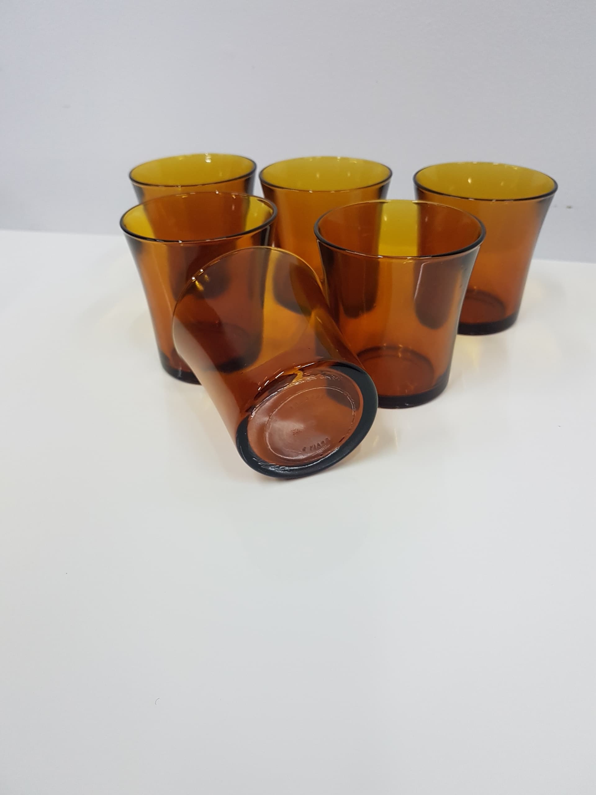 Set of six amber glasses, glass, Duralex, France, 1980s. - 360486