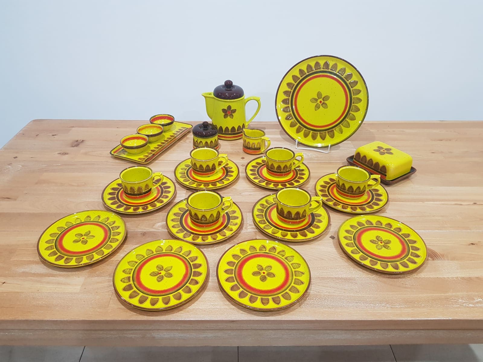 Twenty-five piece dinnerware set, yellow brown orange ceramic, Zell am Harmersbach, Germany, 1980s. - 360865