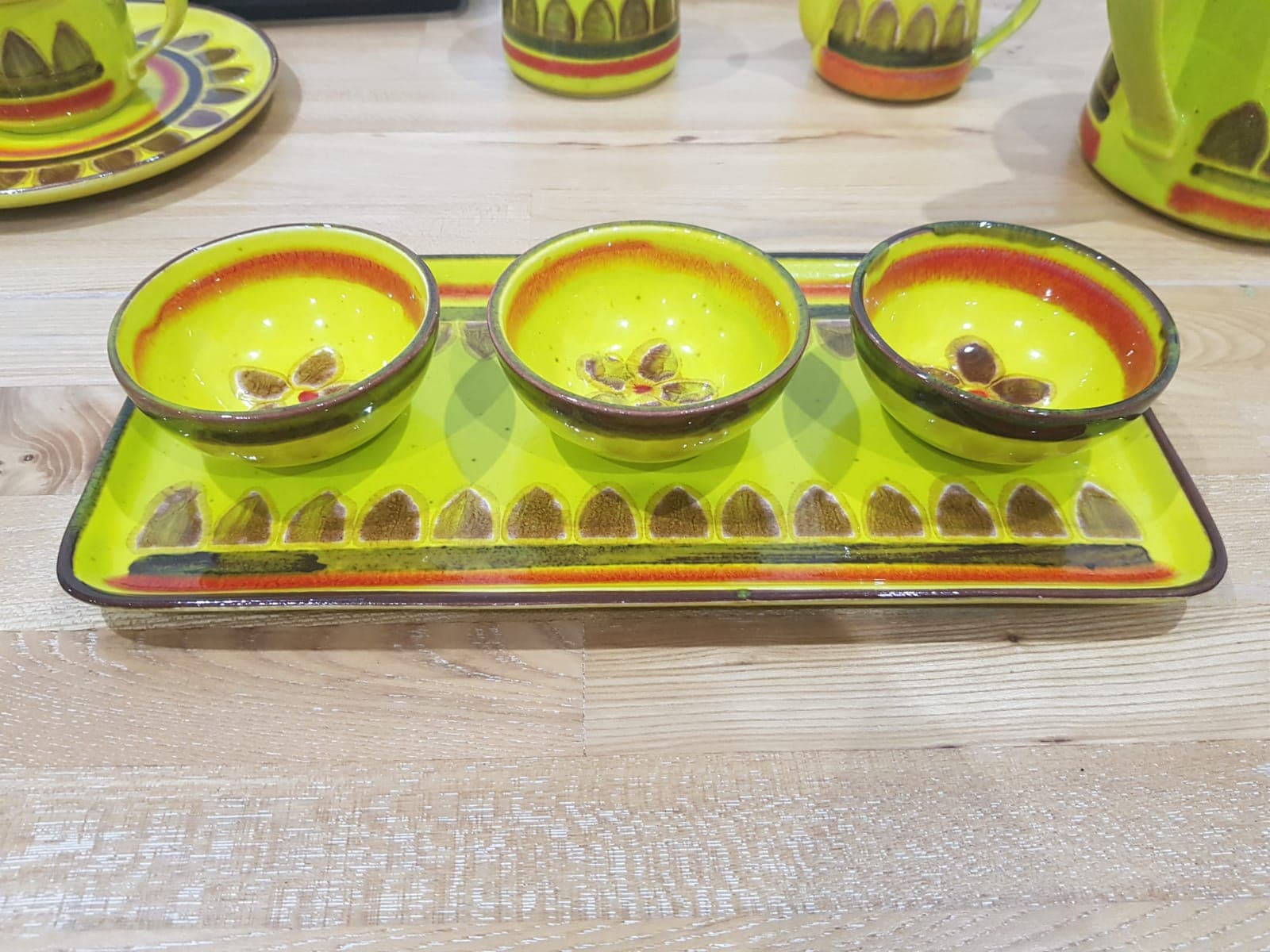 Twenty-five piece dinnerware set, yellow brown orange ceramic, Zell am Harmersbach, Germany, 1980s. - 360868