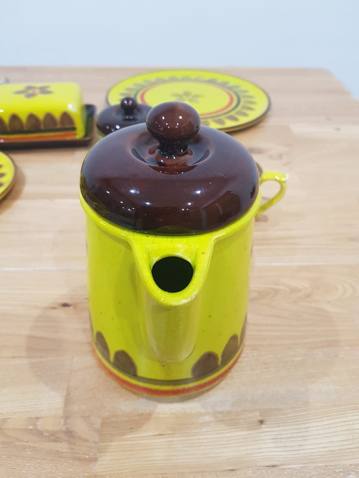 Twenty-five piece dinnerware set, yellow brown orange ceramic, Zell am Harmersbach, Germany, 1980s. - 360866