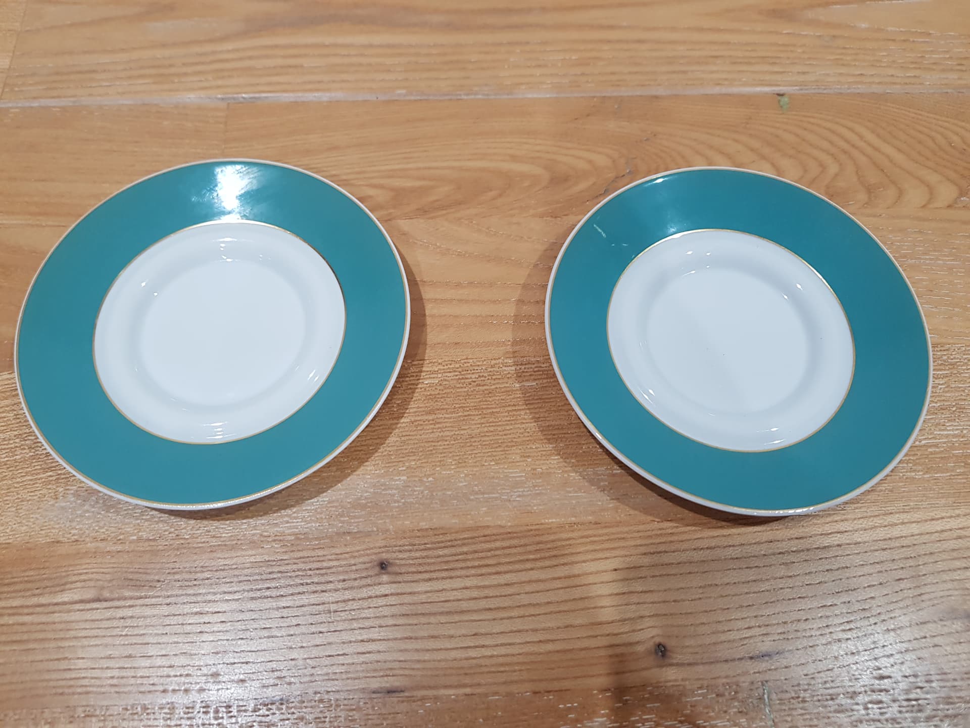 Set of two espresso saucers, turquoise white gold, porcelain, by B. Wiinblad, Germany, 1980s. - 360875
