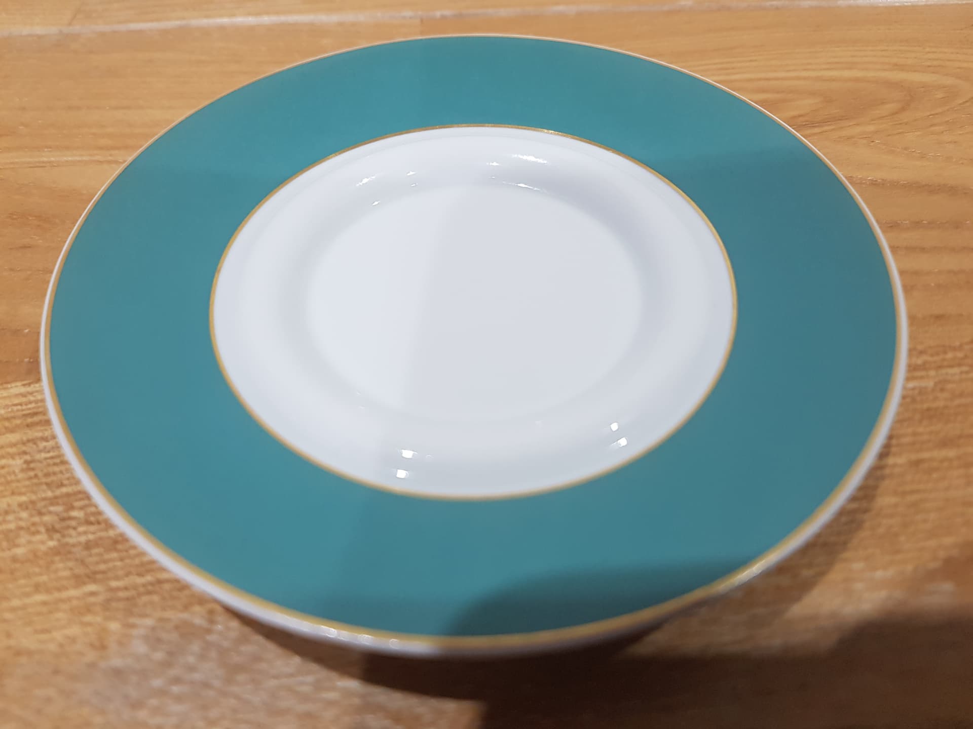 Set of two espresso saucers, turquoise white gold, porcelain, by B. Wiinblad, Germany, 1980s. - 360876
