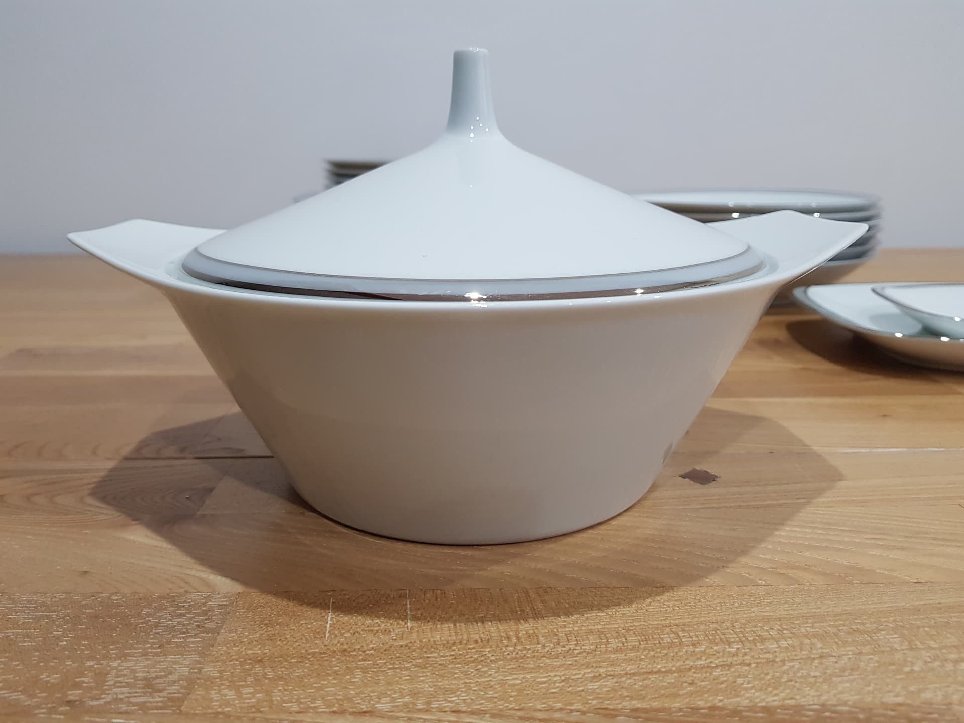 Twelve-piece dinnerware set Berlin, white porcelain, platinum, by H. T. Baumann, Rosenthal, Germany, 1960s. - 361609