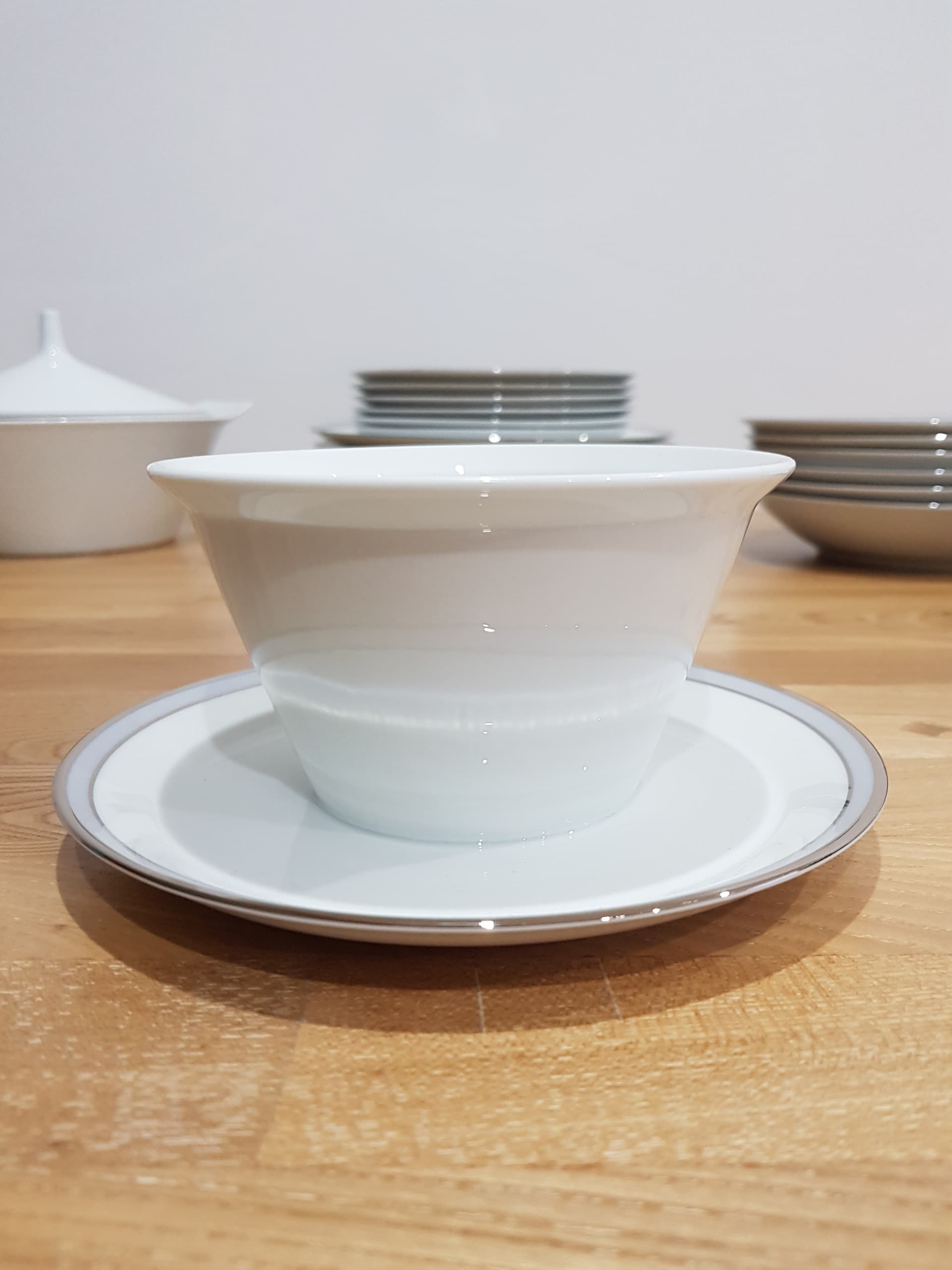 Twelve-piece dinnerware set Berlin, white porcelain, platinum, by H. T. Baumann, Rosenthal, Germany, 1960s. - 361608