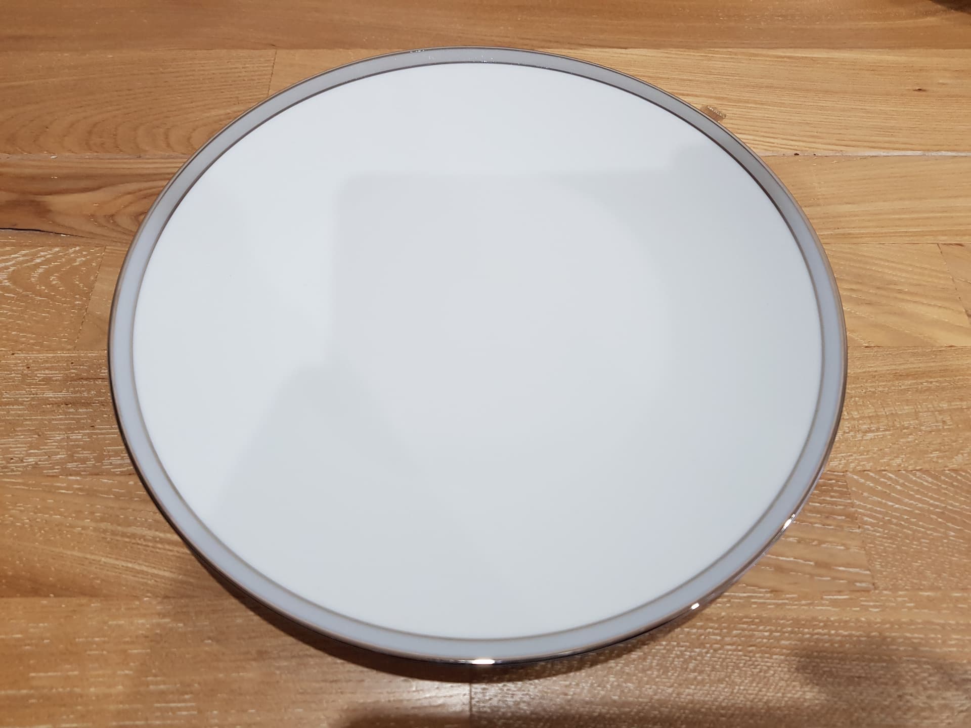 Twelve-piece dinnerware set Berlin, white porcelain, platinum, by H. T. Baumann, Rosenthal, Germany, 1960s. - 361613
