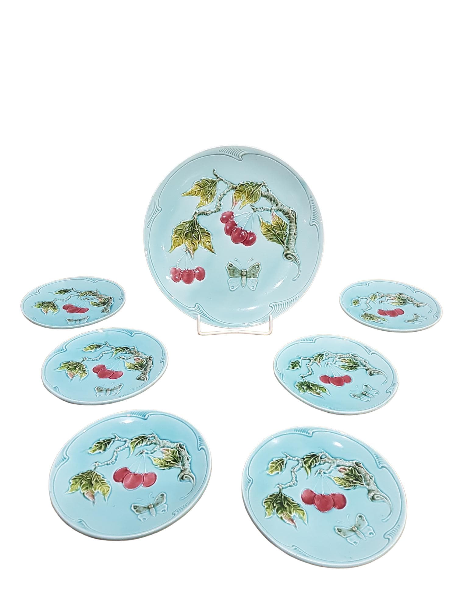 Seven-piece set Majolica Cherries and Butterfly, blue red green yellow white, ceramic, Germany, 1950s
