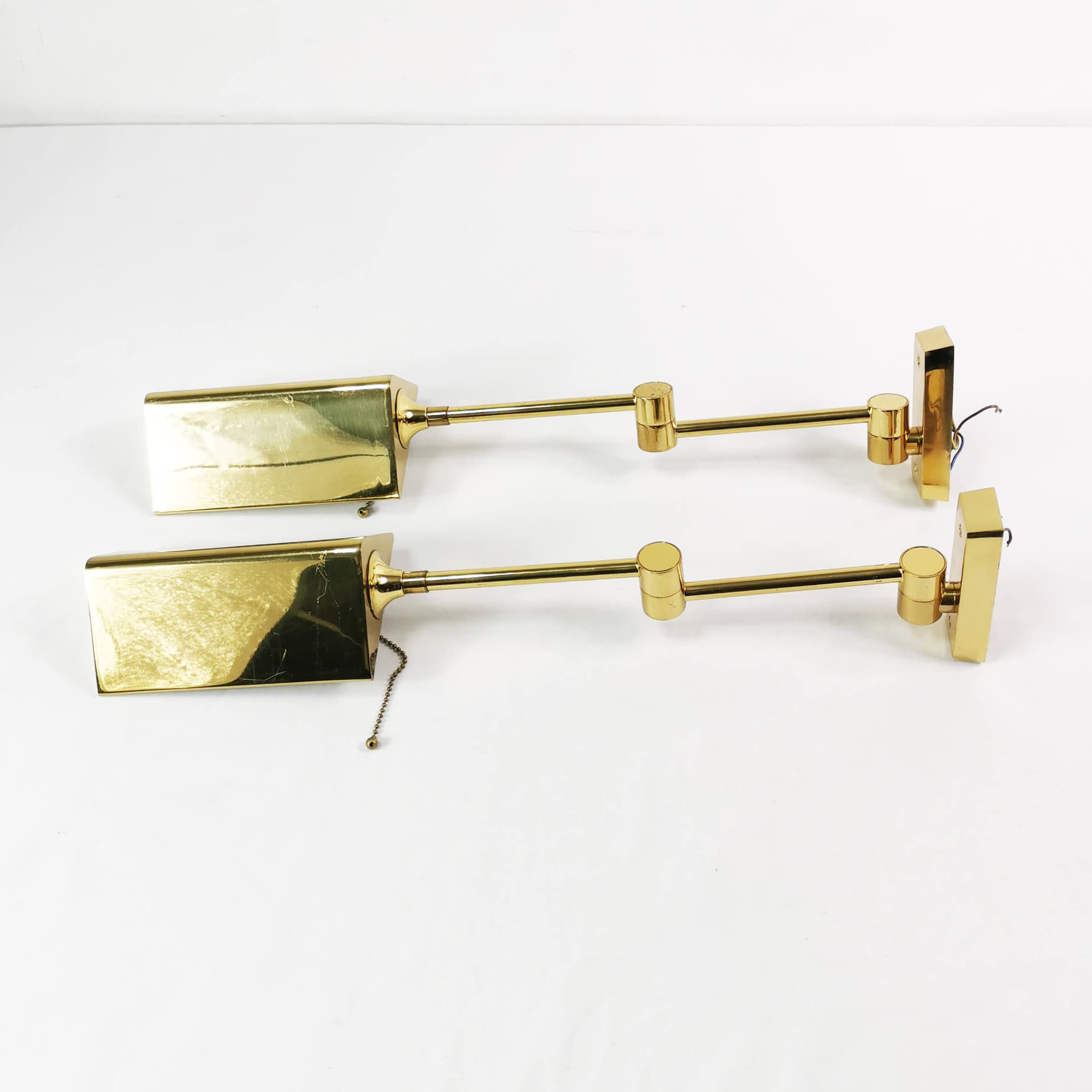 Pair of modernist wall lamps, gold metal, brass, Baulmann Leuchten, Germany, 1970s - 362021