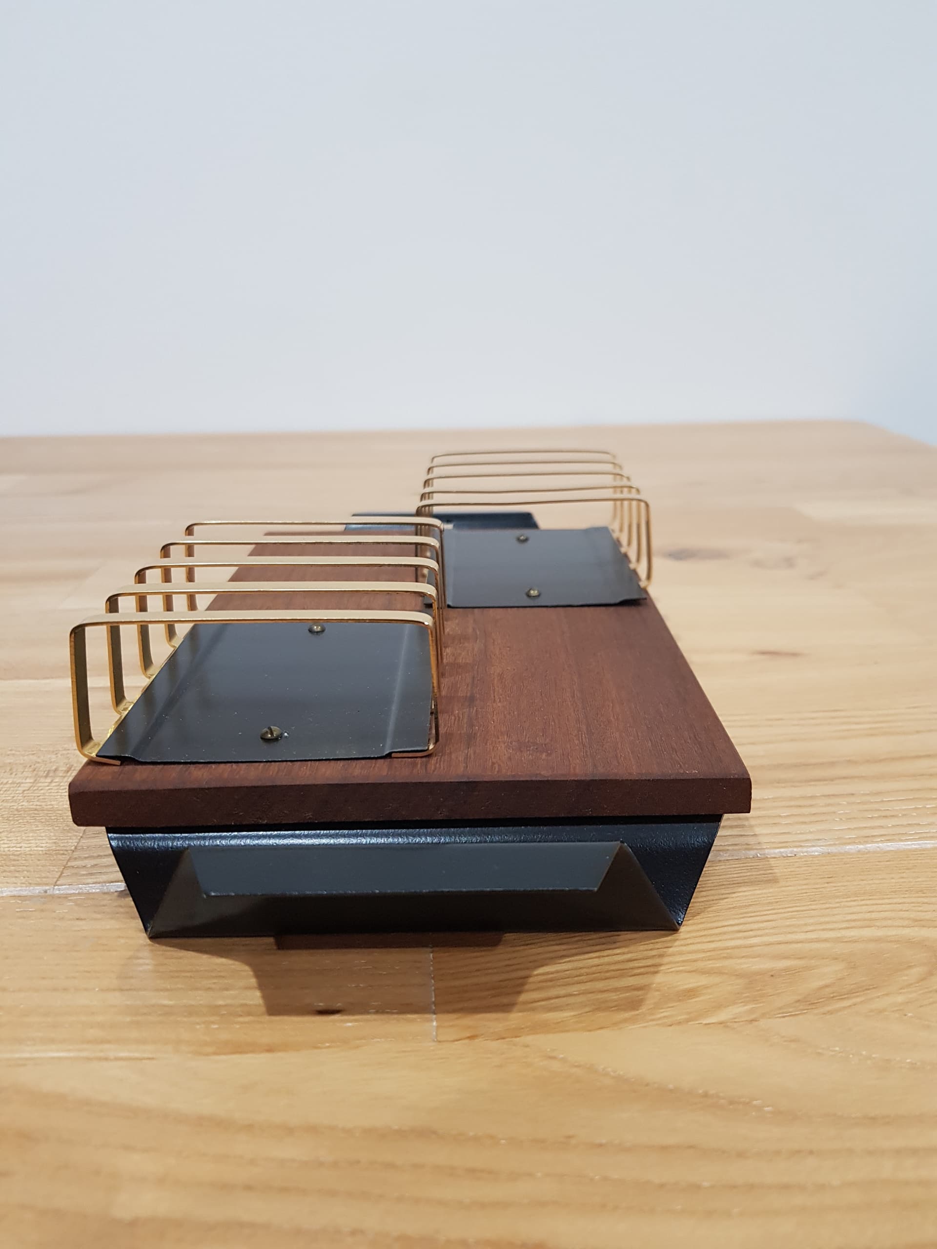 Toast rack, brown teak, golden brass, black metal, Denmark, 1960s. - 362474