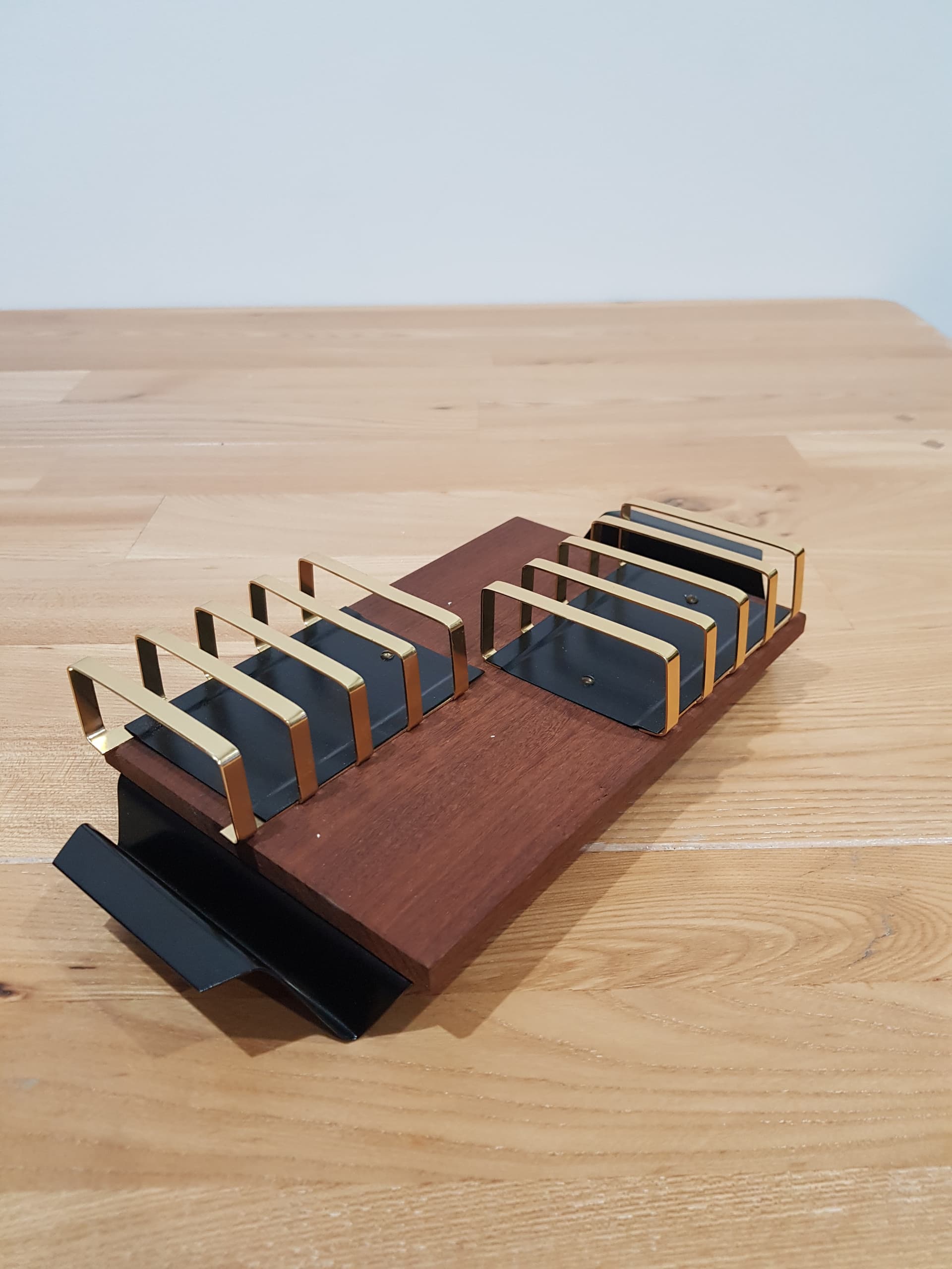 Toast rack, brown teak, golden brass, black metal, Denmark, 1960s. - 362480