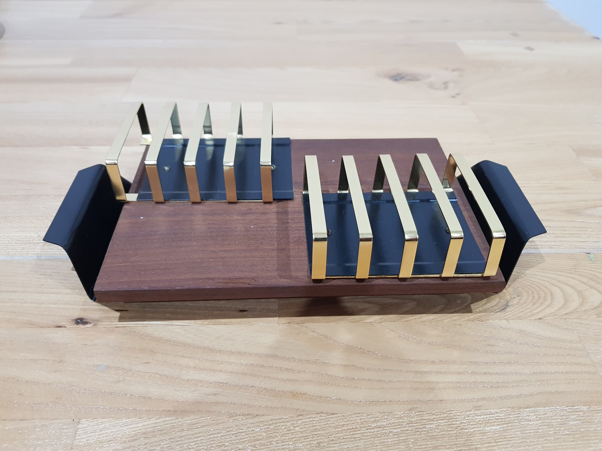 Toast rack, brown teak, golden brass, black metal, Denmark, 1960s. - 362476