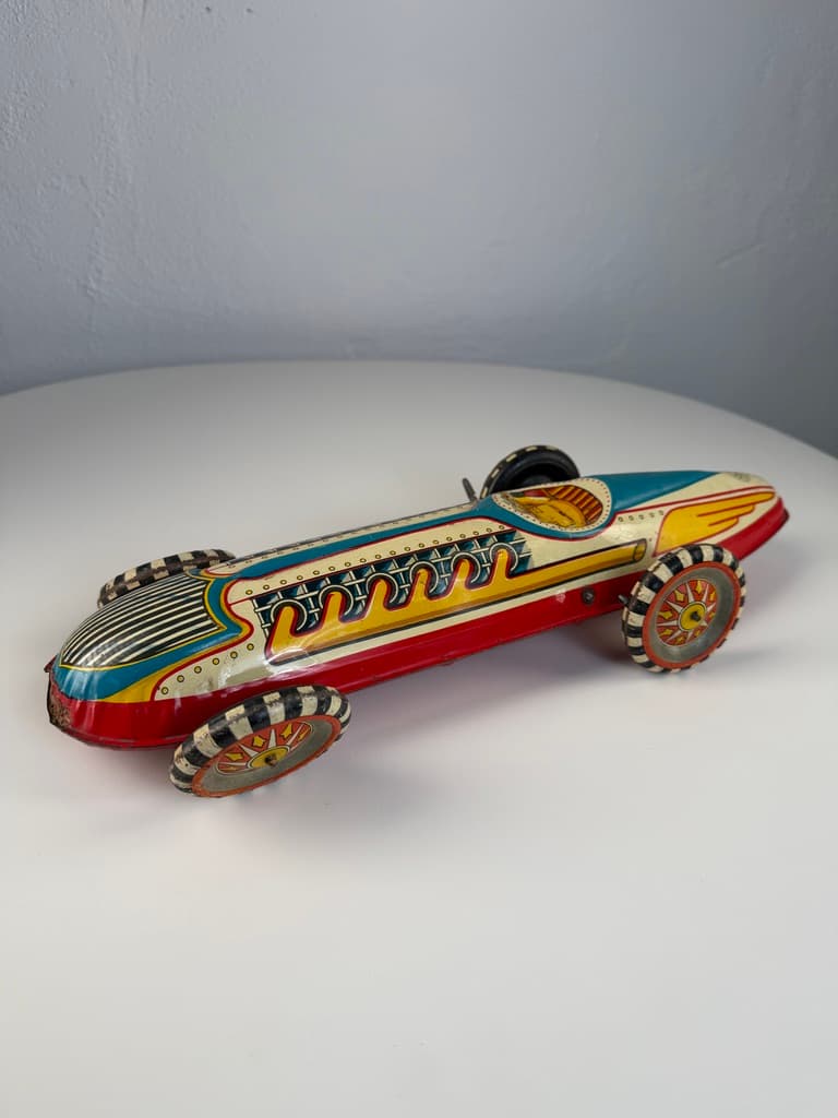 Racing car Boat Tail Racer, beige red blue yellow black white, metal, United States, 1930s. - 364704
