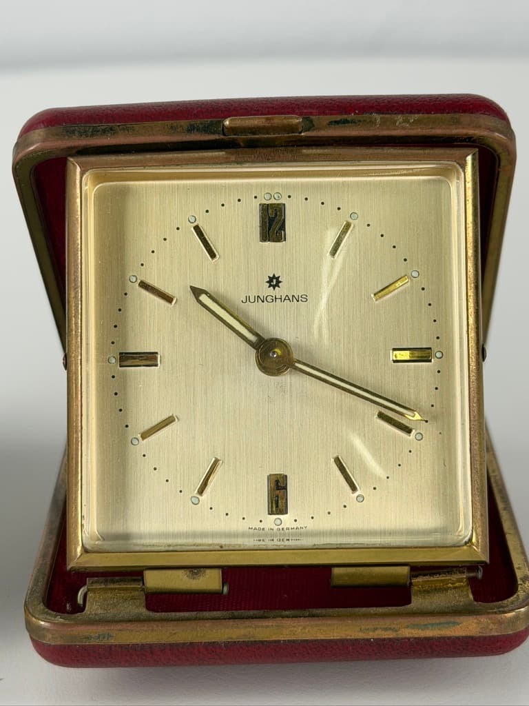 Set of two travel clocks, Junghans & Jerger, gold brass, black and burgundy faux leather, Germany, 1960s. - 364763