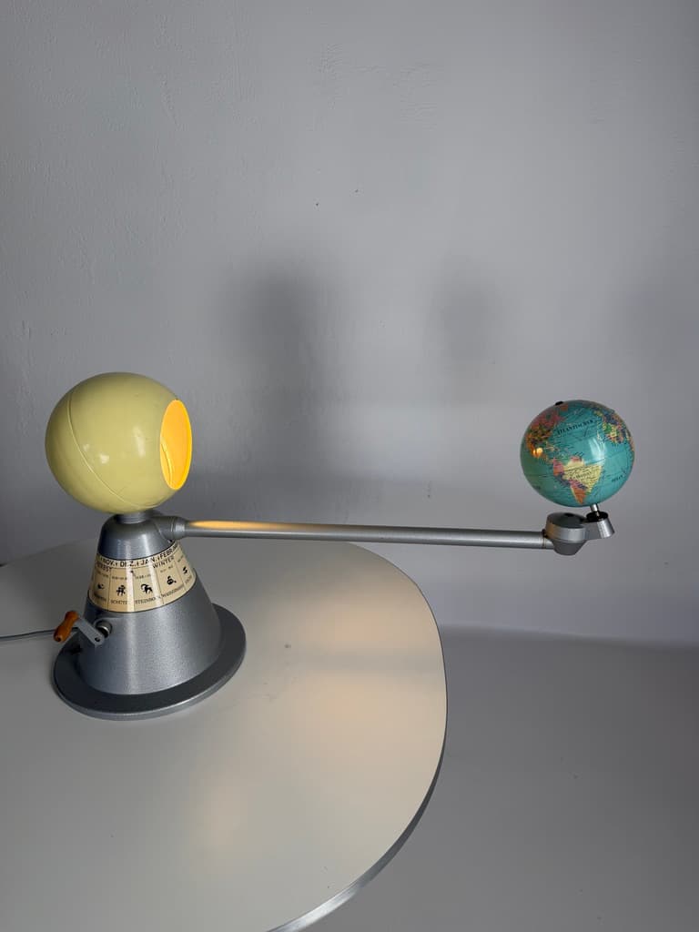 Tellurium, silver metal, yellow plastic, paper, Germany, 1960s. - 365417