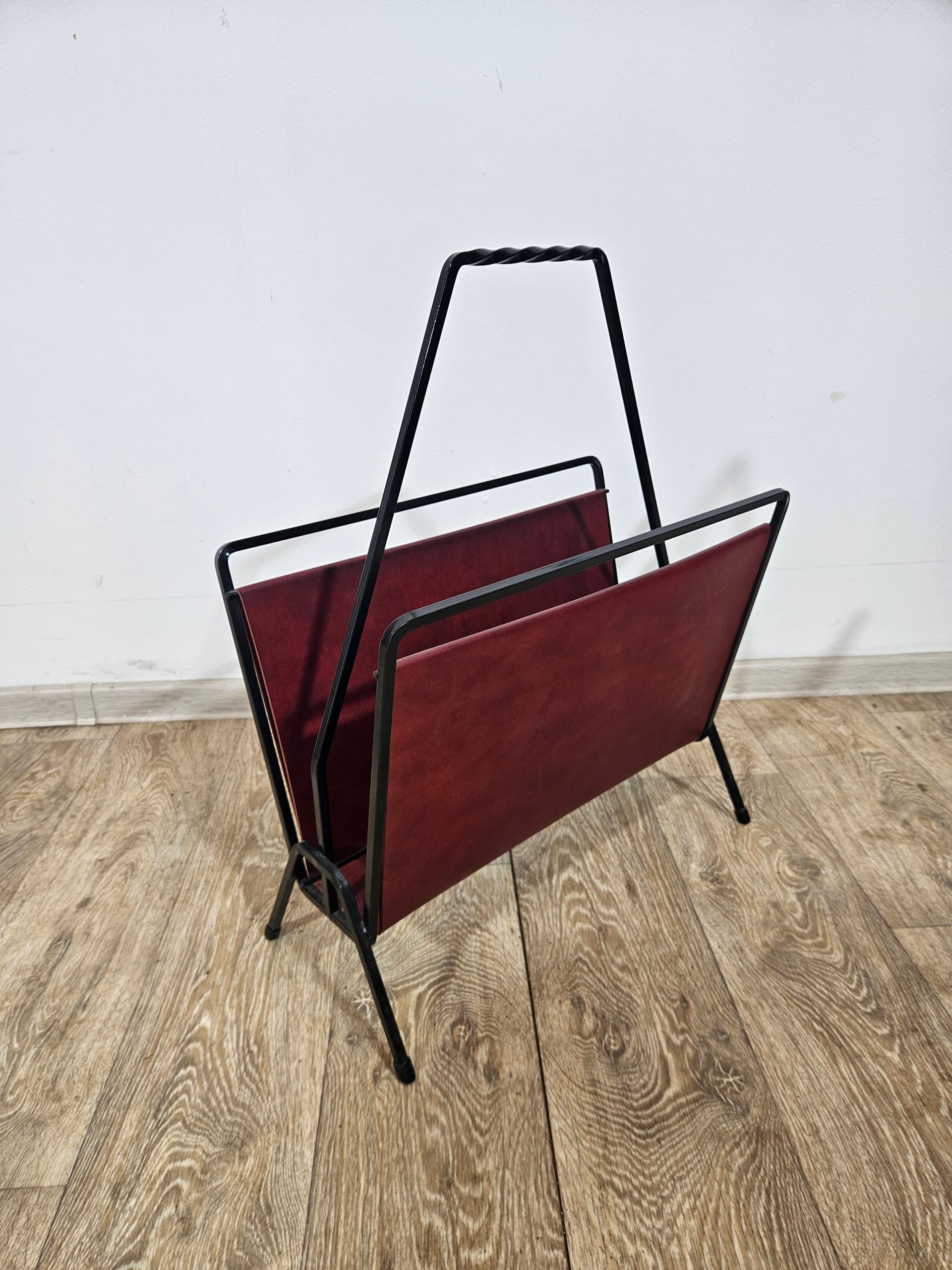 Magazine rack, burgundy leather, black metal, Germany, 1960s. - 366003