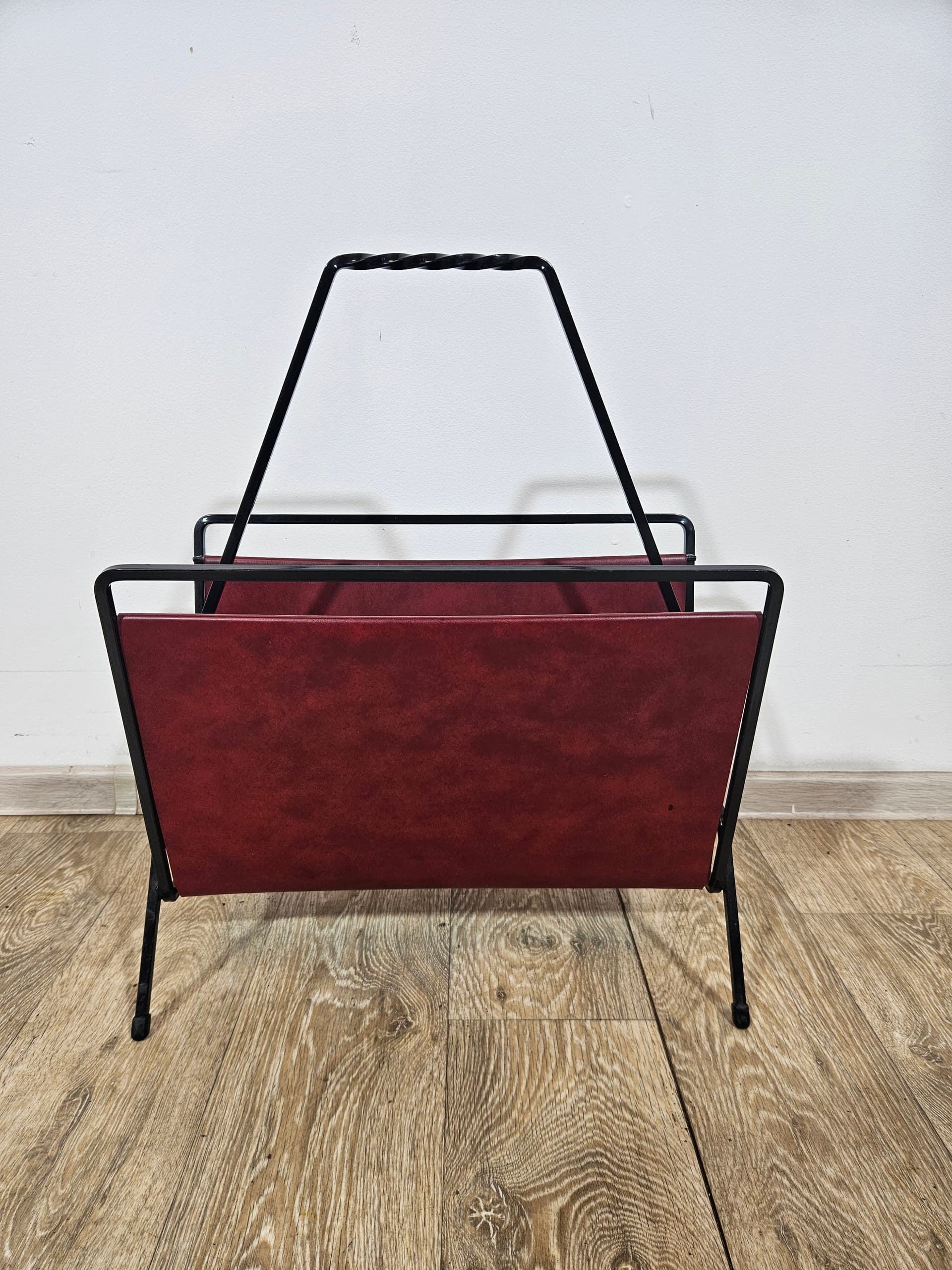 Magazine rack, burgundy leather, black metal, Germany, 1960s. - 366004