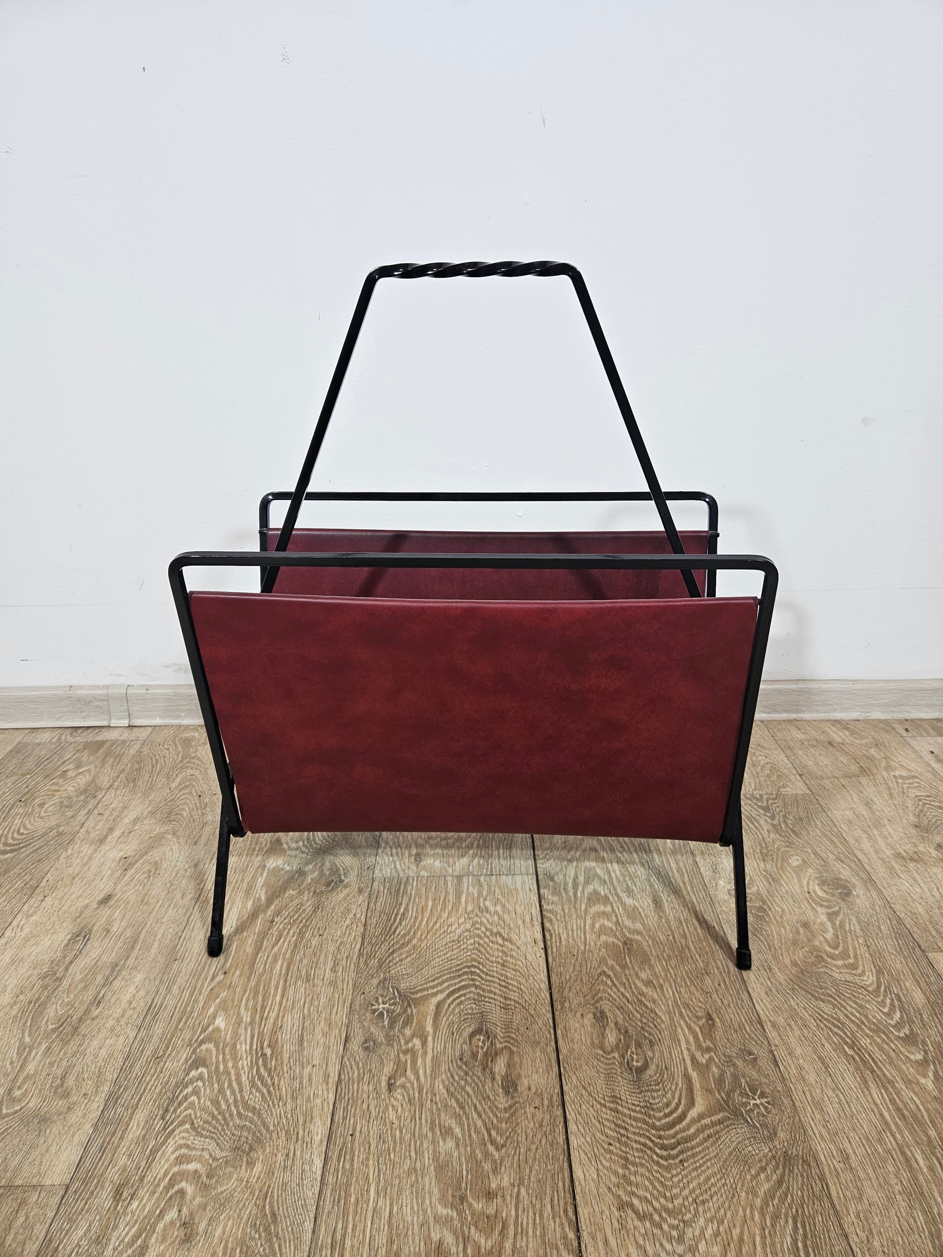 Magazine rack, burgundy leather, black metal, Germany, 1960s. - 366001