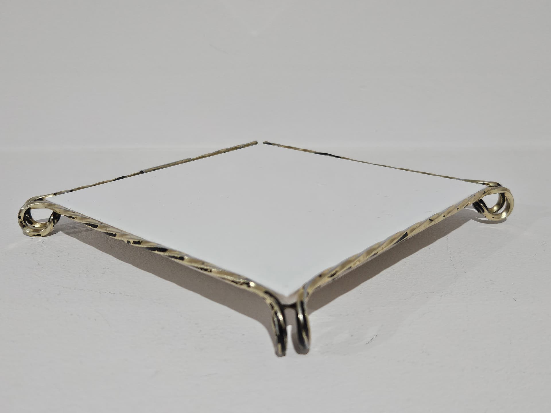 Trivet, white ceramic, golden brass, Germany, 1980s. - 366161