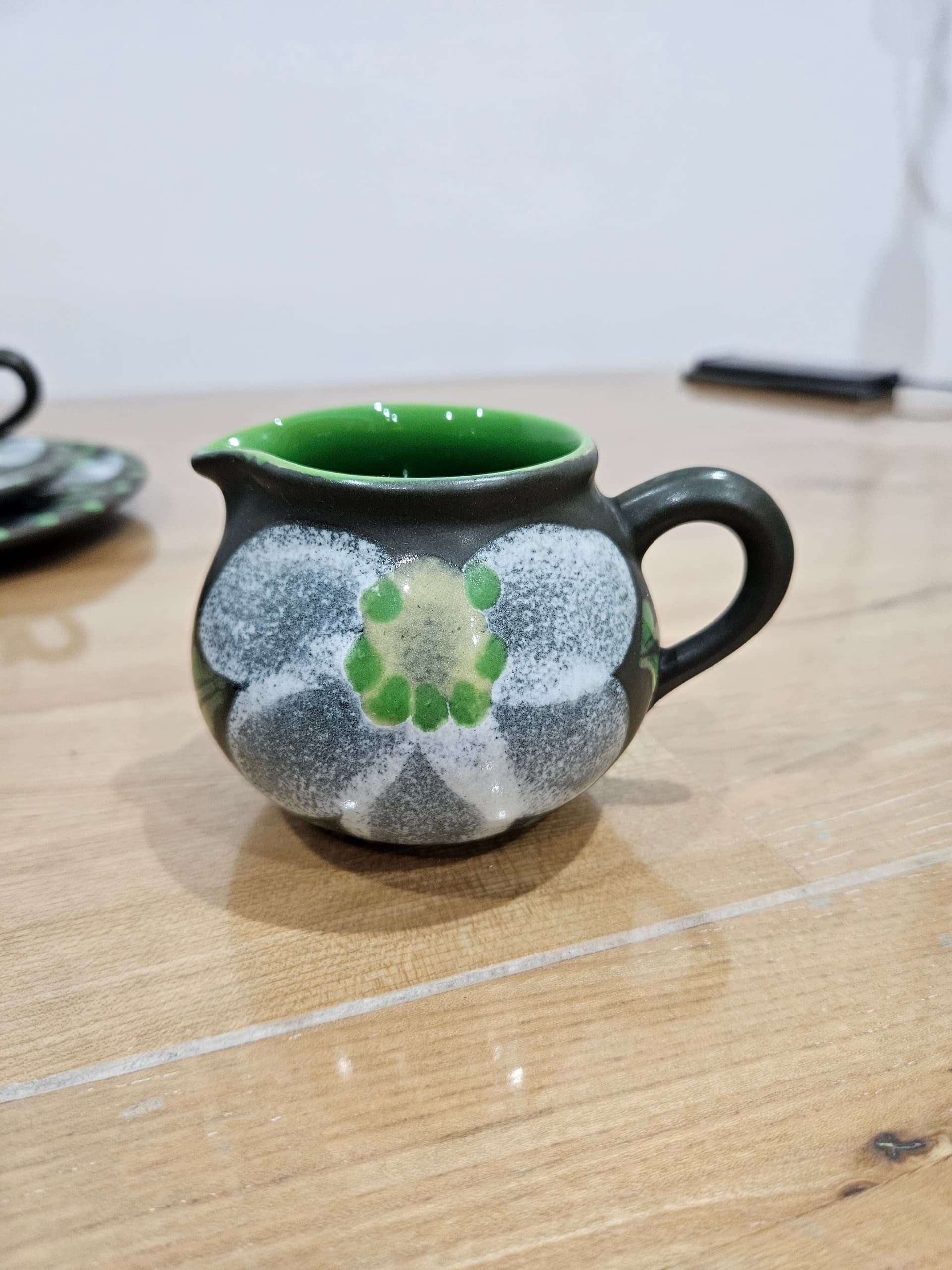 Twenty-two piece coffee and tea set, black white grey green ceramic, Argentina, 1980s. - 366867