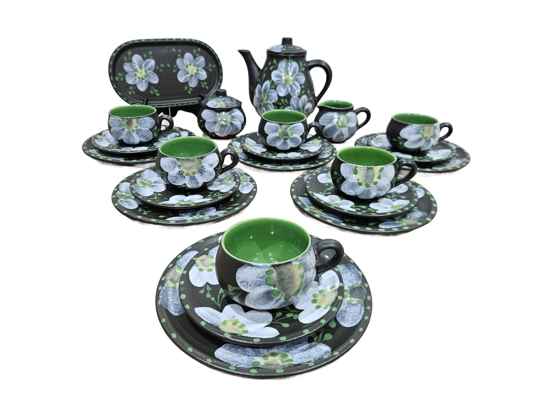 Twenty-two piece coffee and tea set, black white grey green ceramic, Argentina, 1980s.