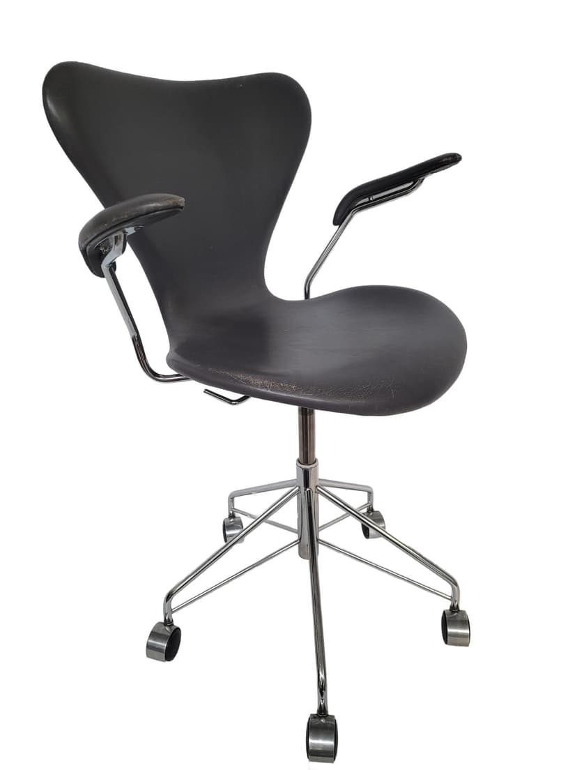 Swivel Armchair Model 3217, black leather, chromed steel, by A. Jacobsen, Denmark, 1990s.