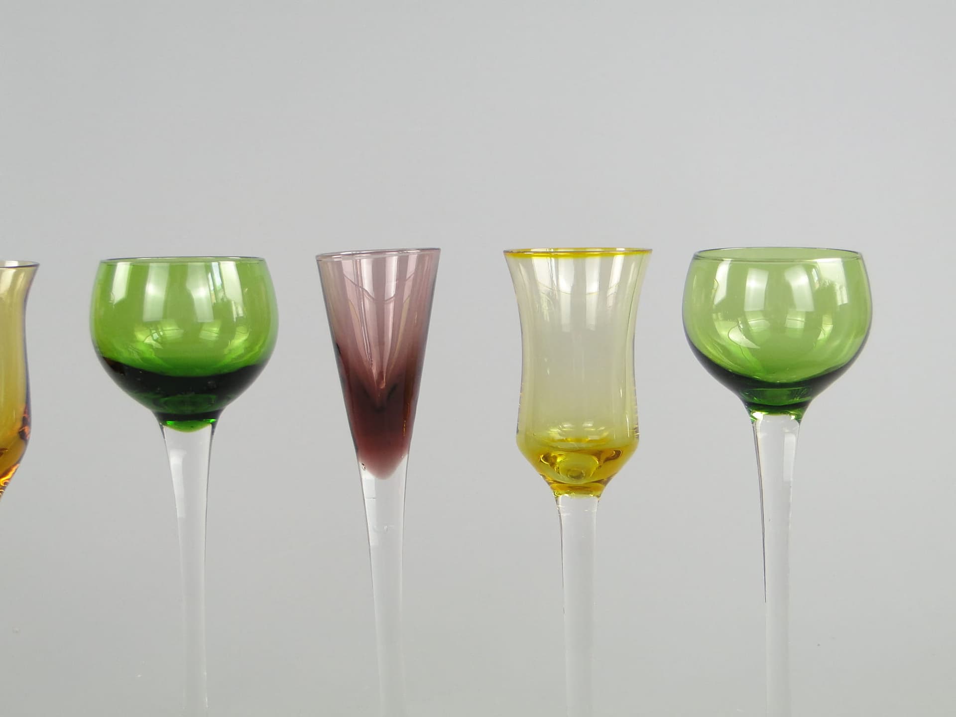 Set of liqueur glasses, green yellow blue purple clear glass, Italy, 1970s. - 367487