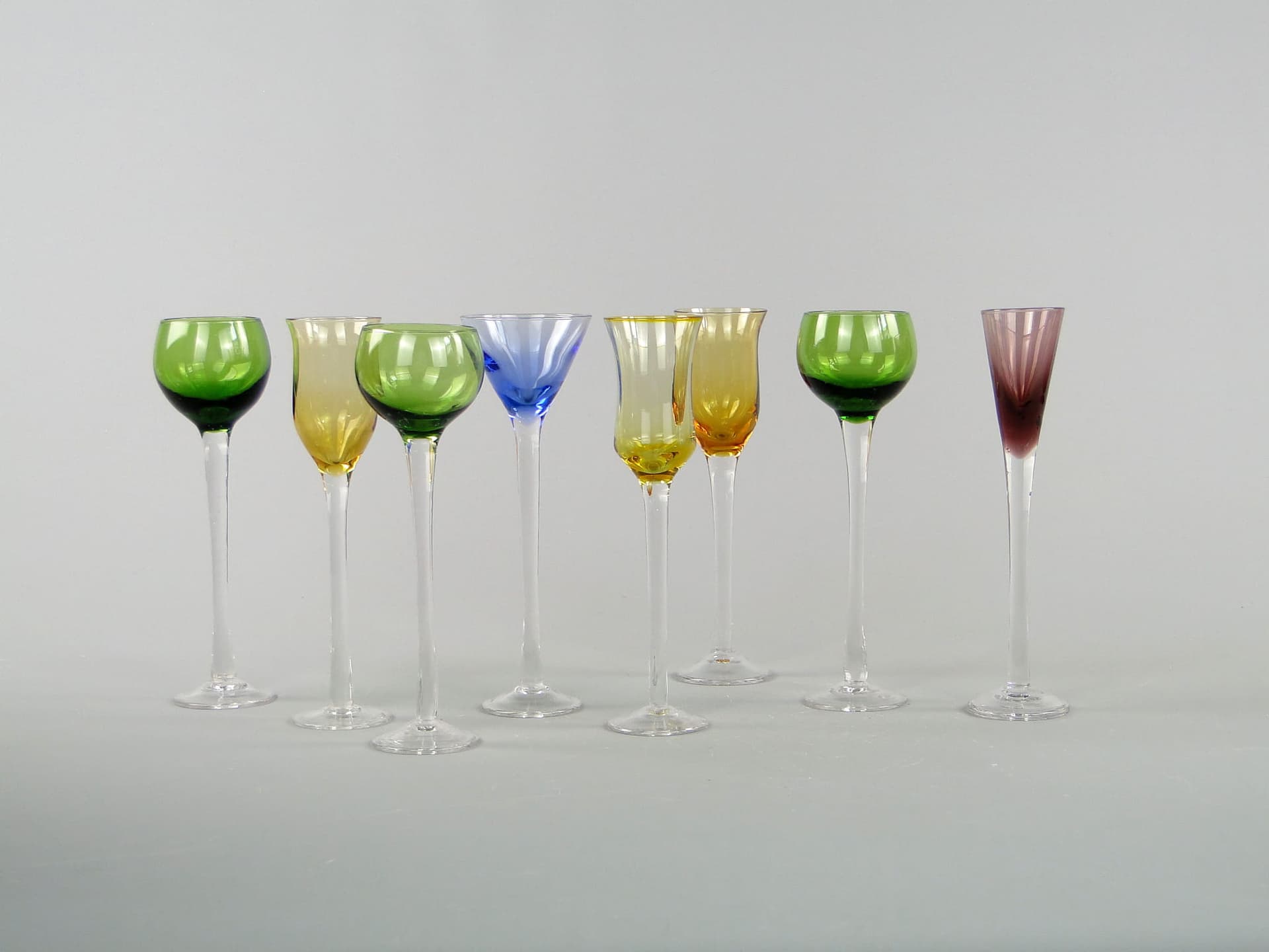 Set of liqueur glasses, green yellow blue purple clear glass, Italy, 1970s. - 367492