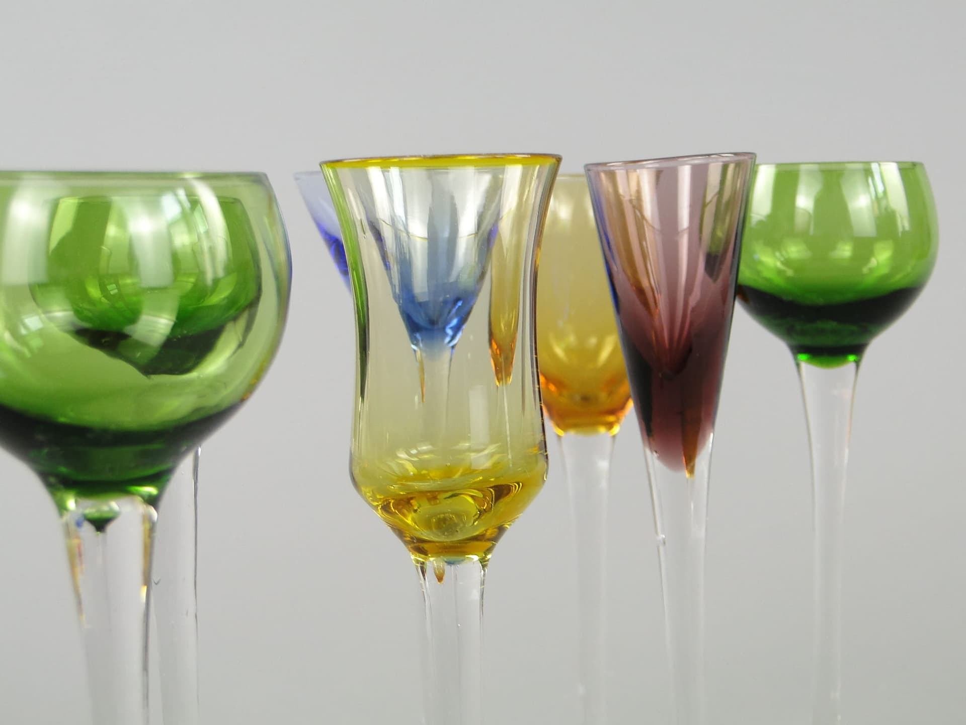 Set of liqueur glasses, green yellow blue purple clear glass, Italy, 1970s. - 367488