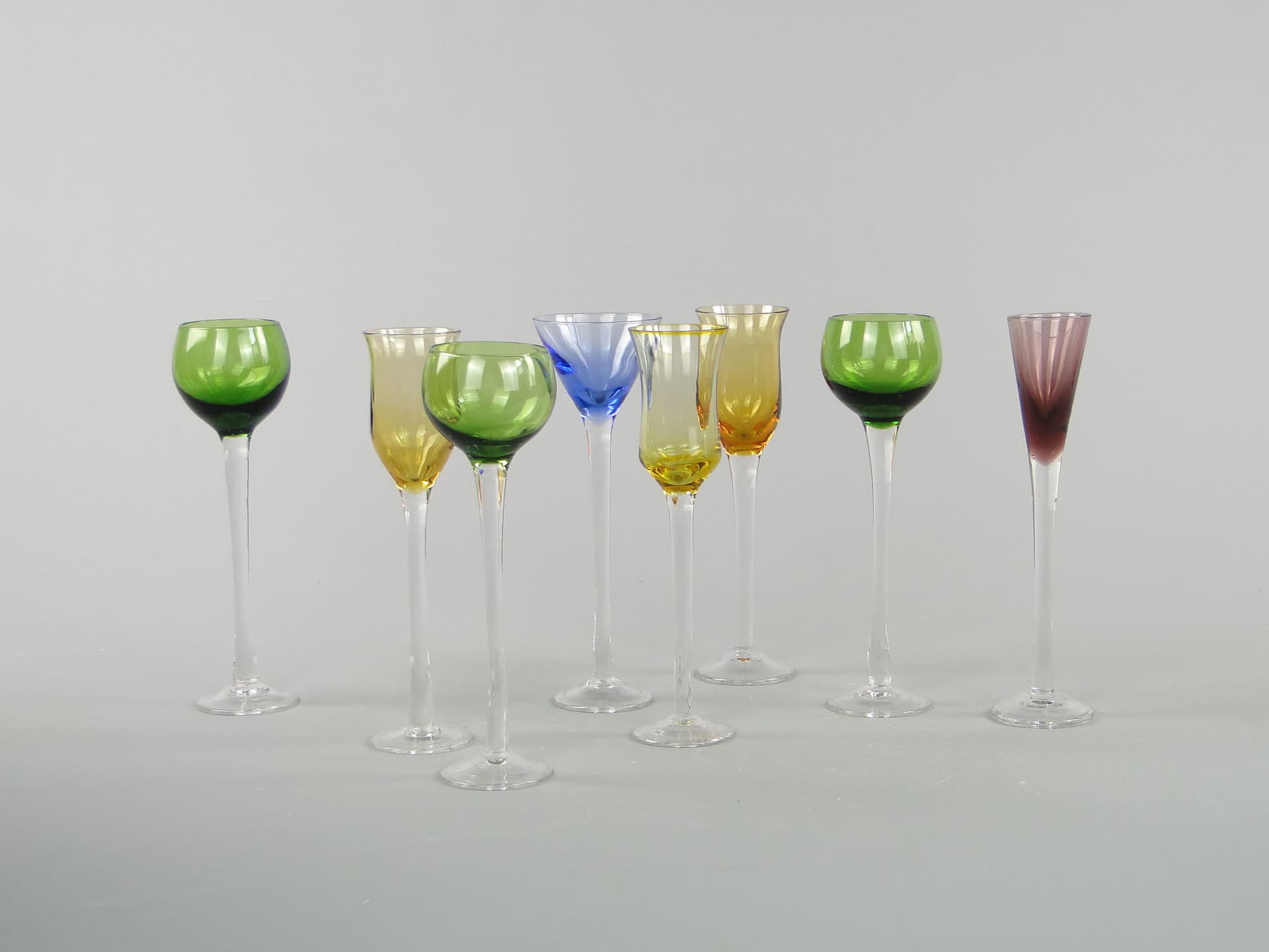 Set of liqueur glasses, green yellow blue purple clear glass, Italy, 1970s. - 367489