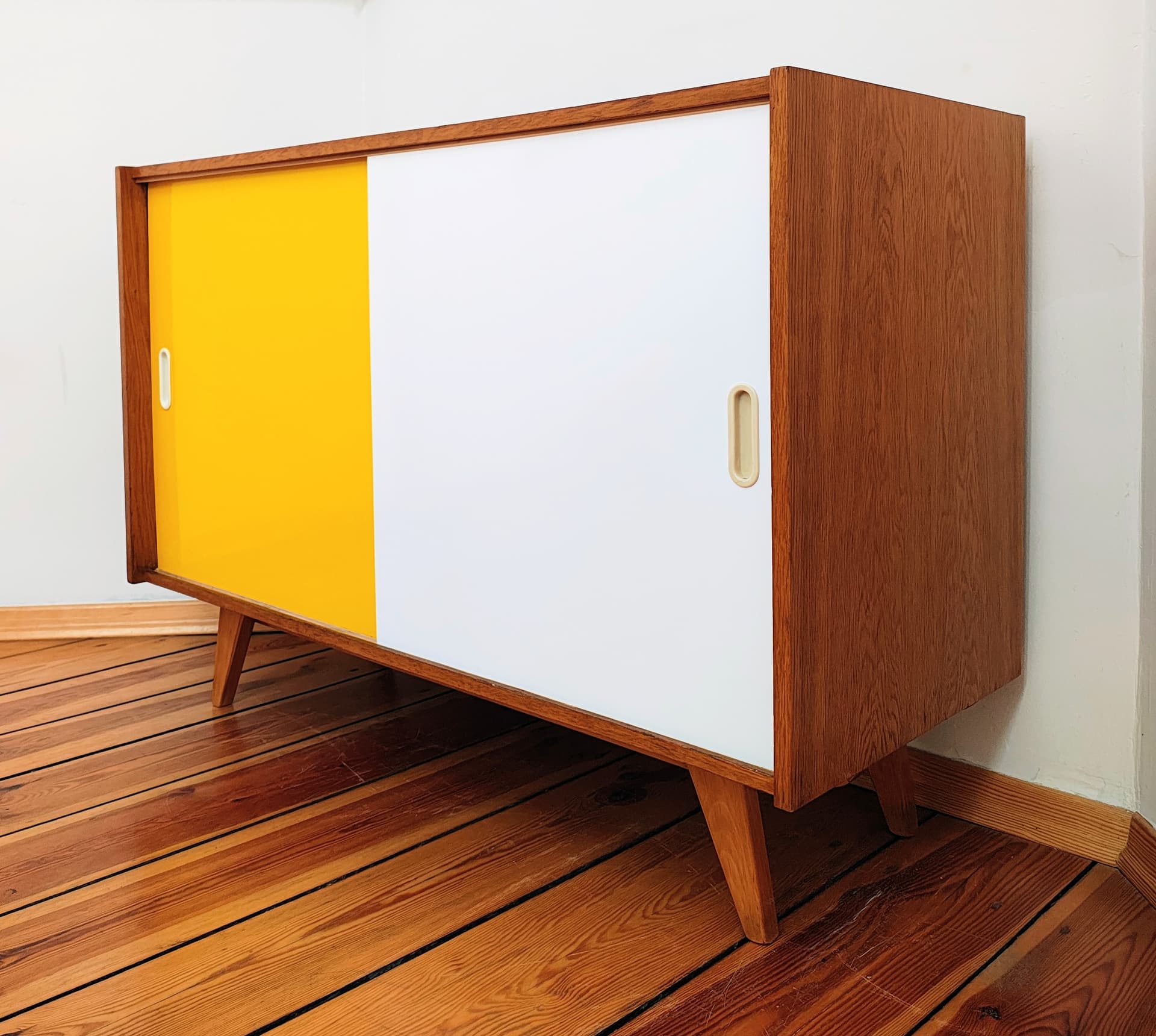 Sideboard, light brown wood, white, yellow, by J. Jiroutek, Interiér Praha, Czechoslovakia, 1960s. - 385040