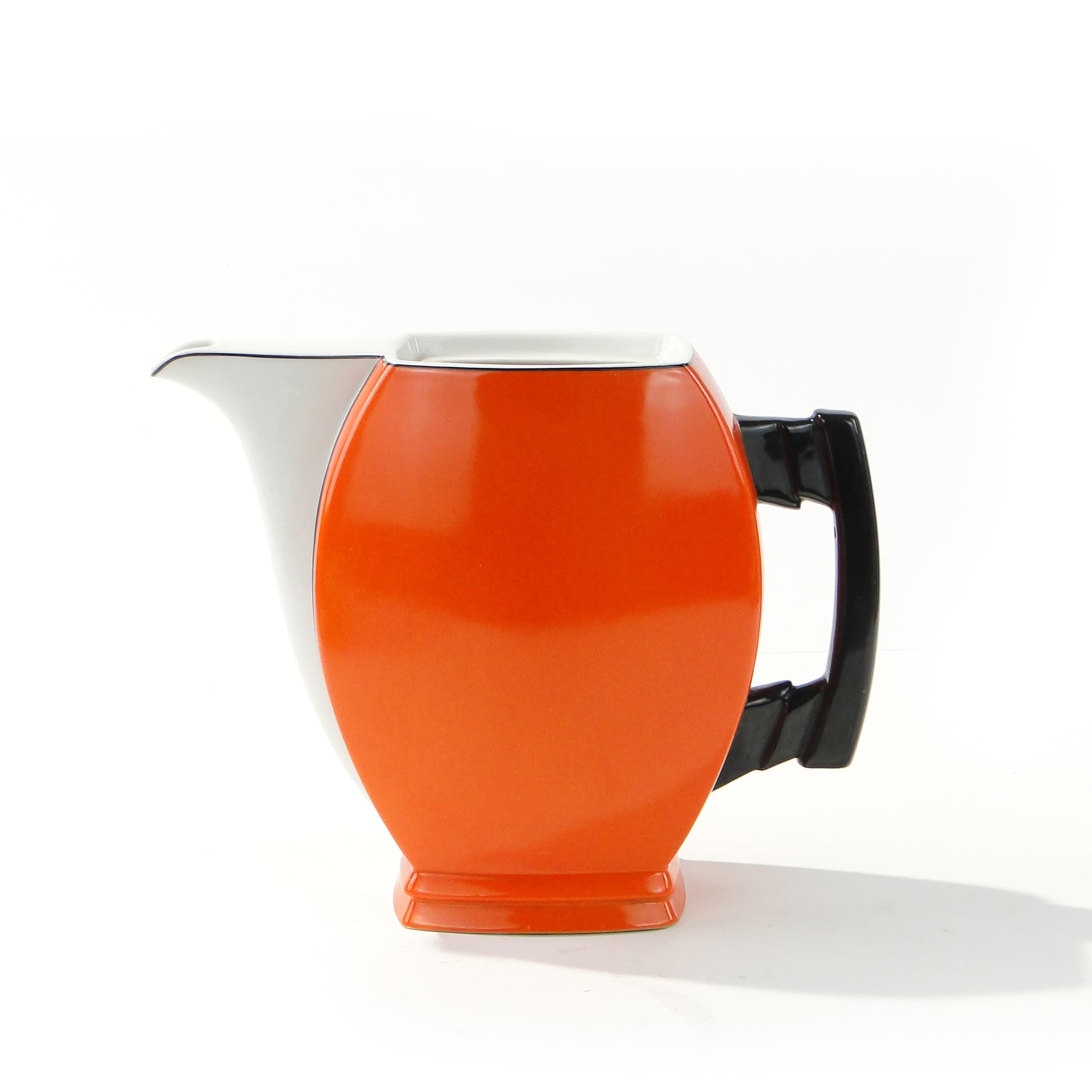 Coffee pot Płaski, orange white black, porcelain, by B. Wendorf, Ćmielów, 1930s. - 388080