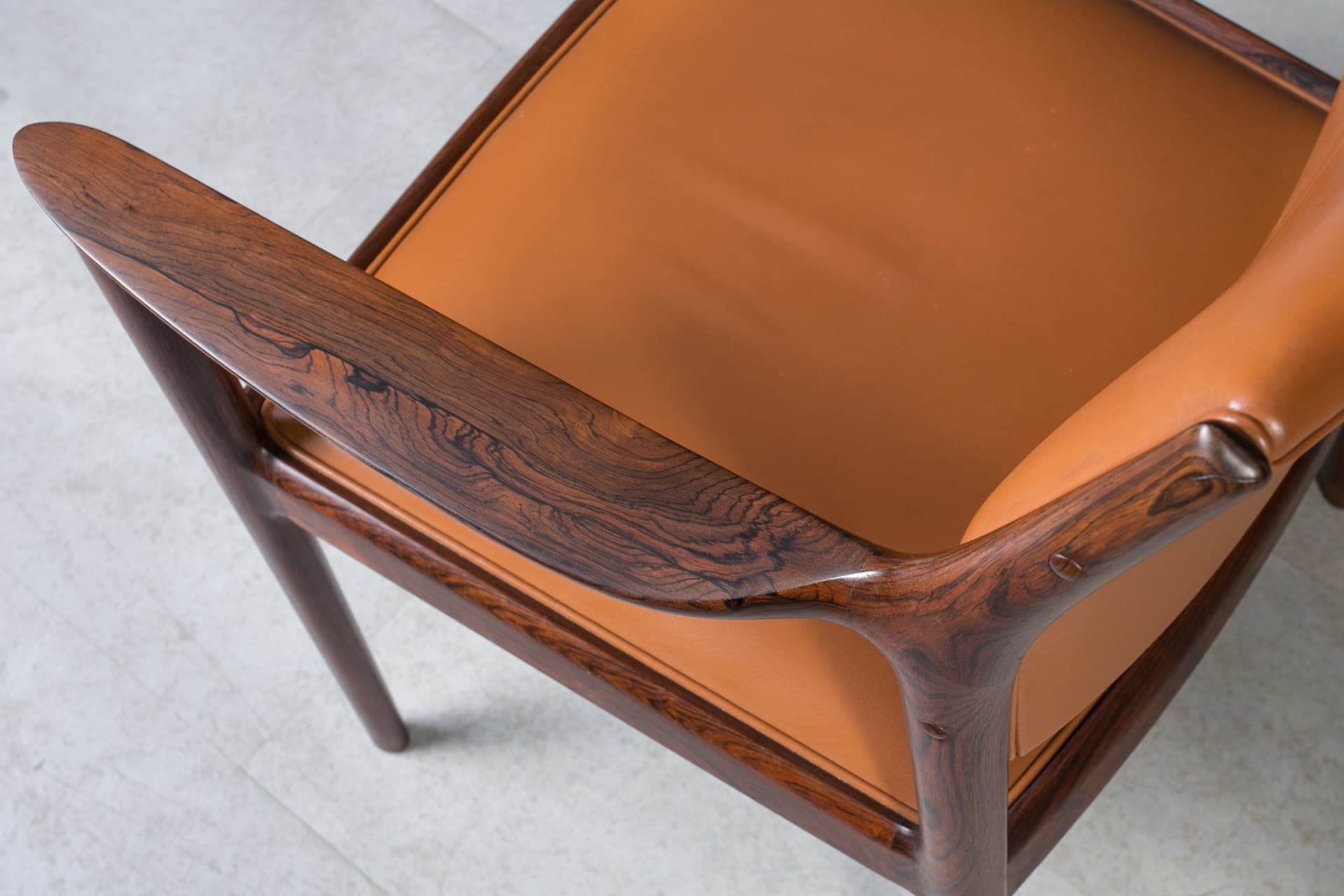 Set of four chairs Elton, cognac leather, dark brown rosewood, by T. Afdal, Norway, 1960s. - 3376