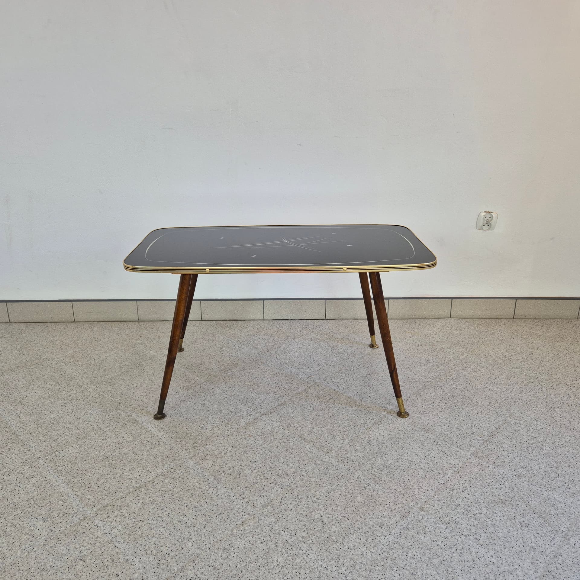 Coffee Table Rockabilly, black glass, brown wood, gold brass, Germany, 1960s. - 388659