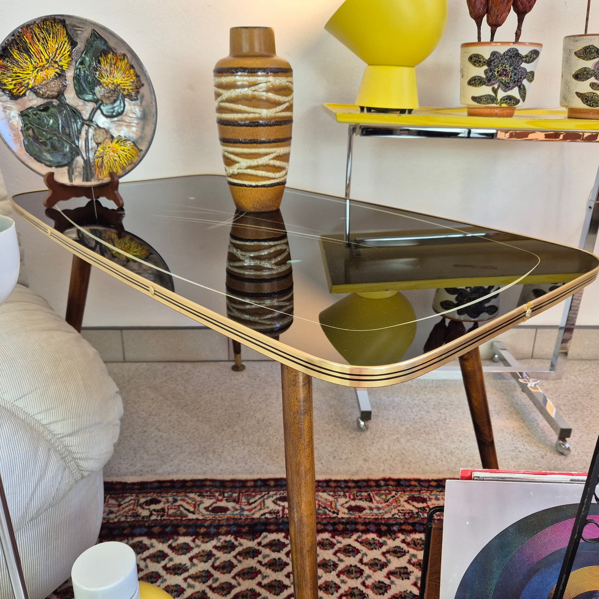 Coffee Table Rockabilly, black glass, brown wood, gold brass, Germany, 1960s. - 388669