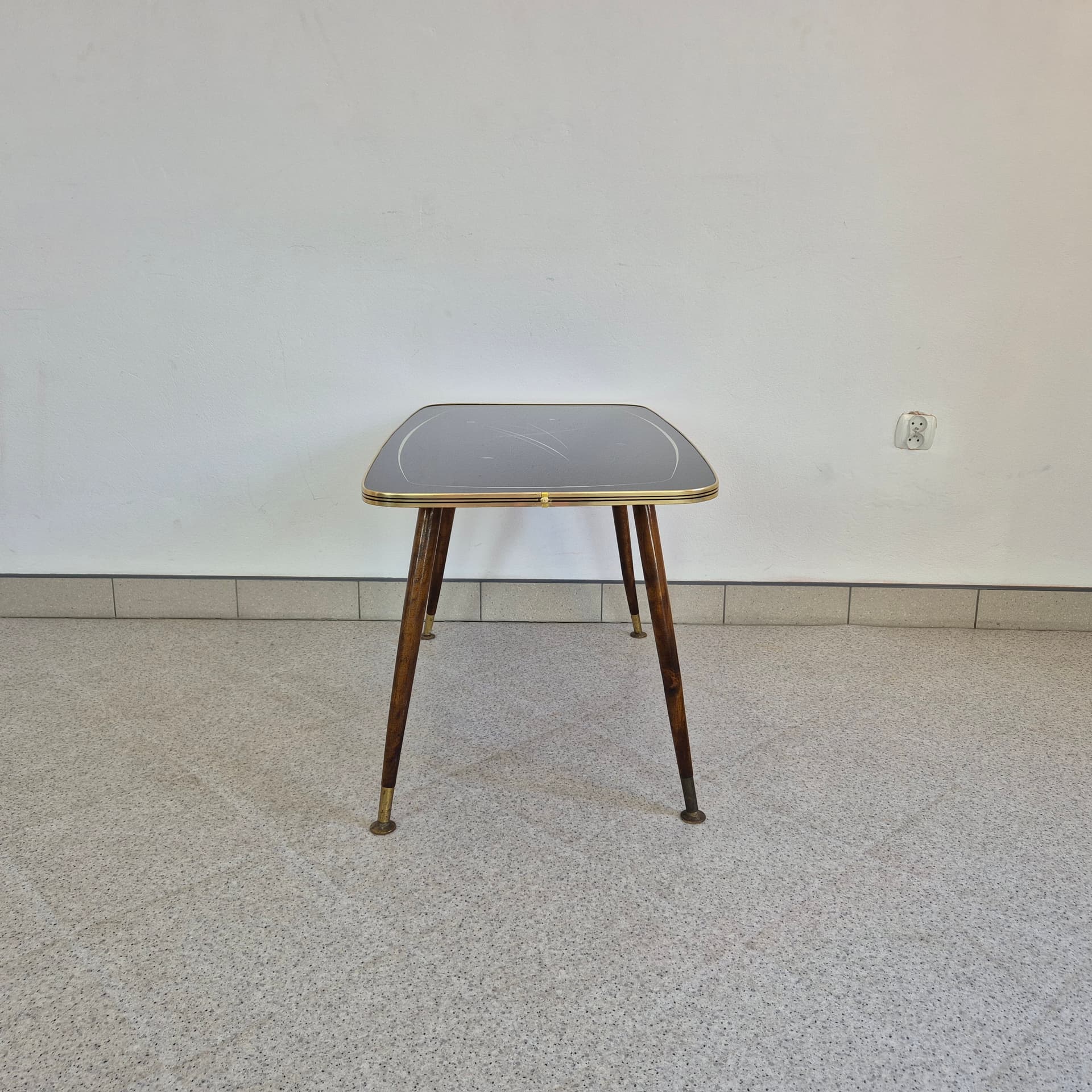 Coffee Table Rockabilly, black glass, brown wood, gold brass, Germany, 1960s. - 388660