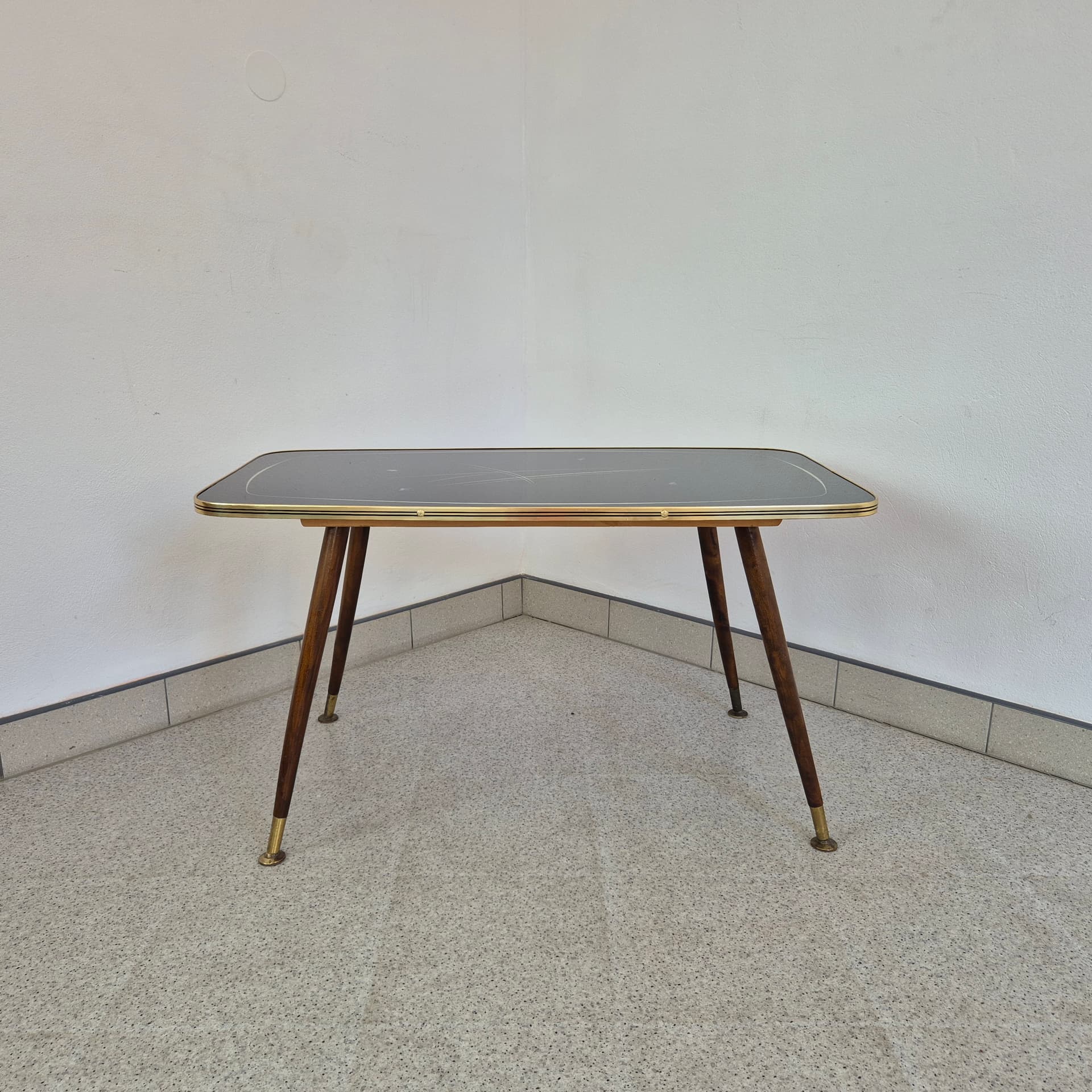 Coffee Table Rockabilly, black glass, brown wood, gold brass, Germany, 1960s. - 388667