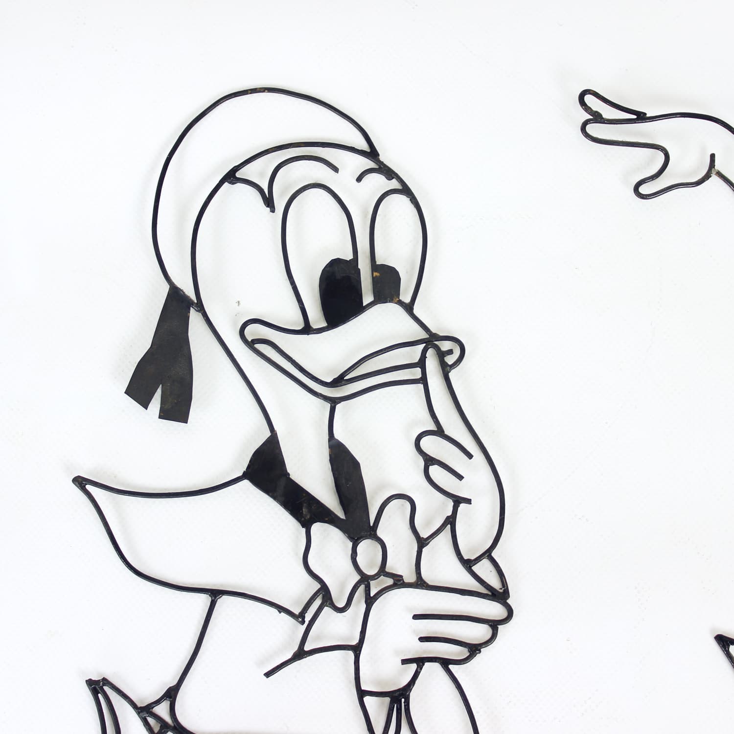 Set of two wall decorations Donald & Daisy Duck, black metal, Disney, Austria, 1960s - 389407
