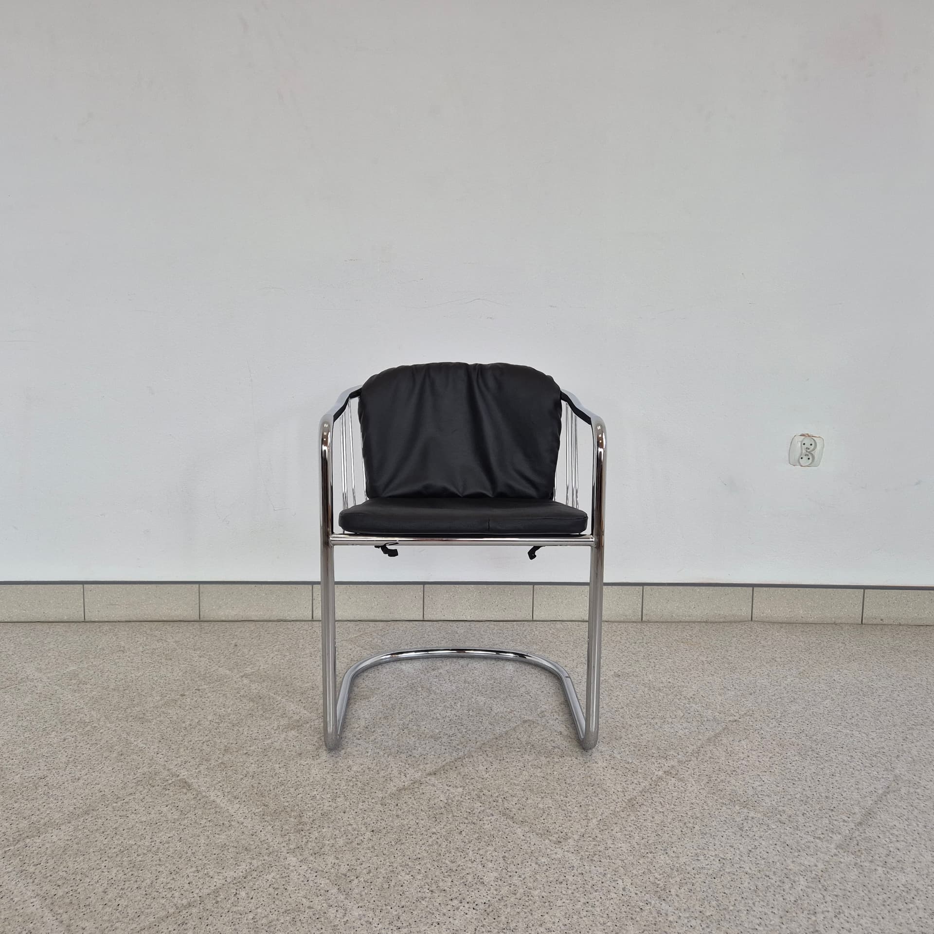 Armchair, black leather, chromed steel, by G. Rinaldi, Italy, 1970s. - 389921