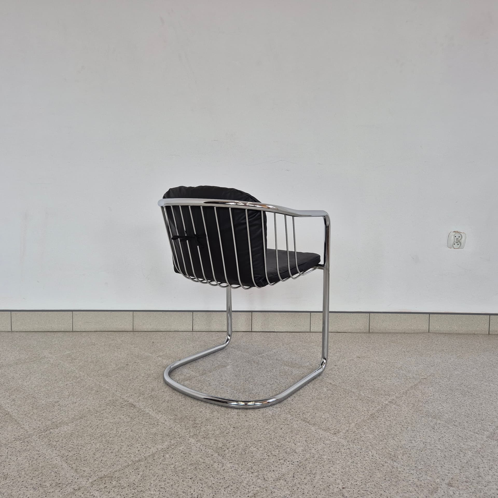 Armchair, black leather, chromed steel, by G. Rinaldi, Italy, 1970s. - 389920
