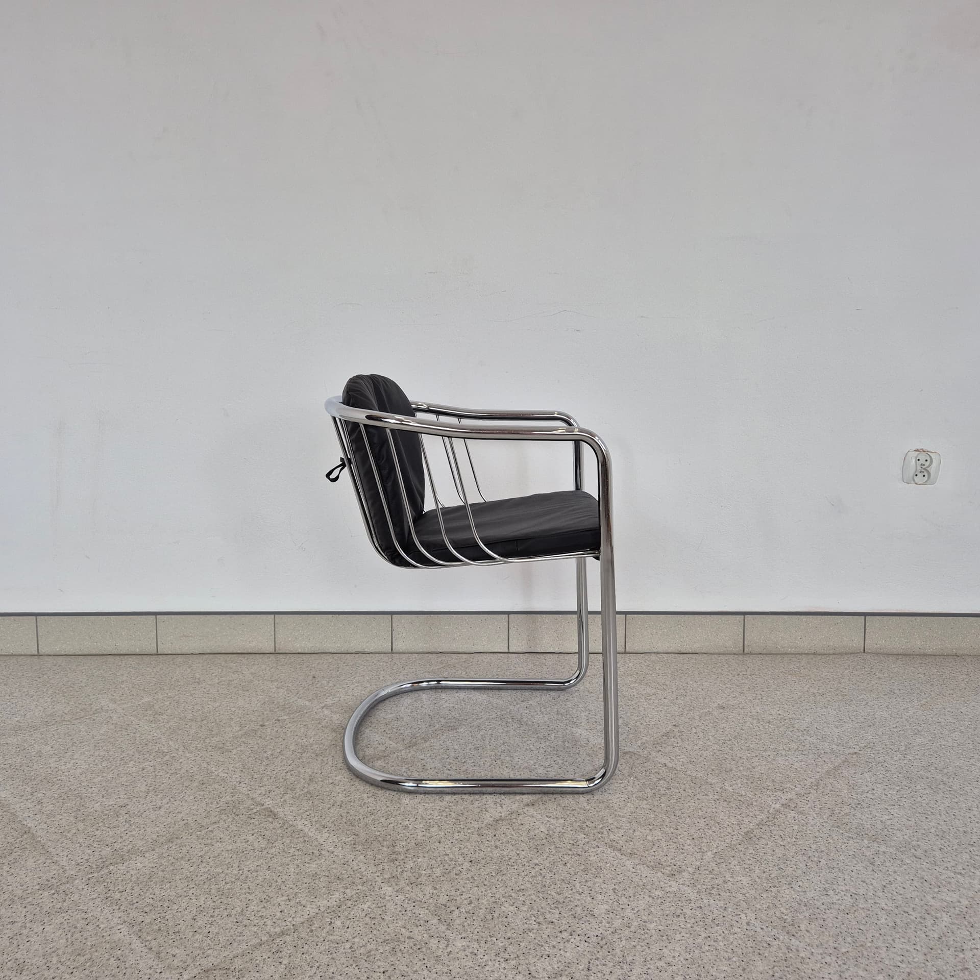 Armchair, black leather, chromed steel, by G. Rinaldi, Italy, 1970s. - 389918