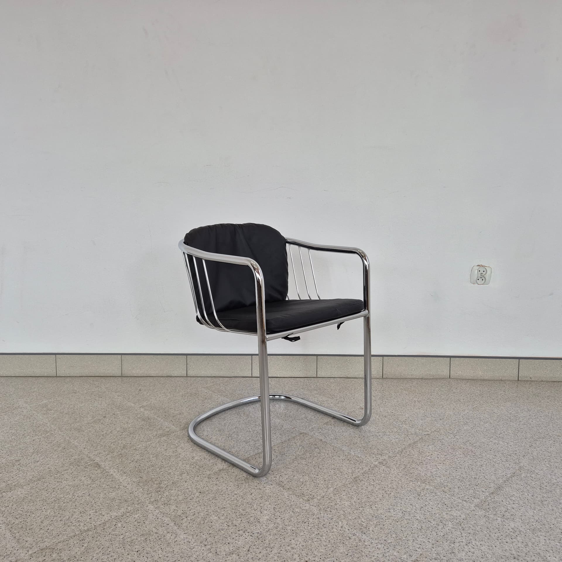 Armchair, black leather, chromed steel, by G. Rinaldi, Italy, 1970s. - 389915