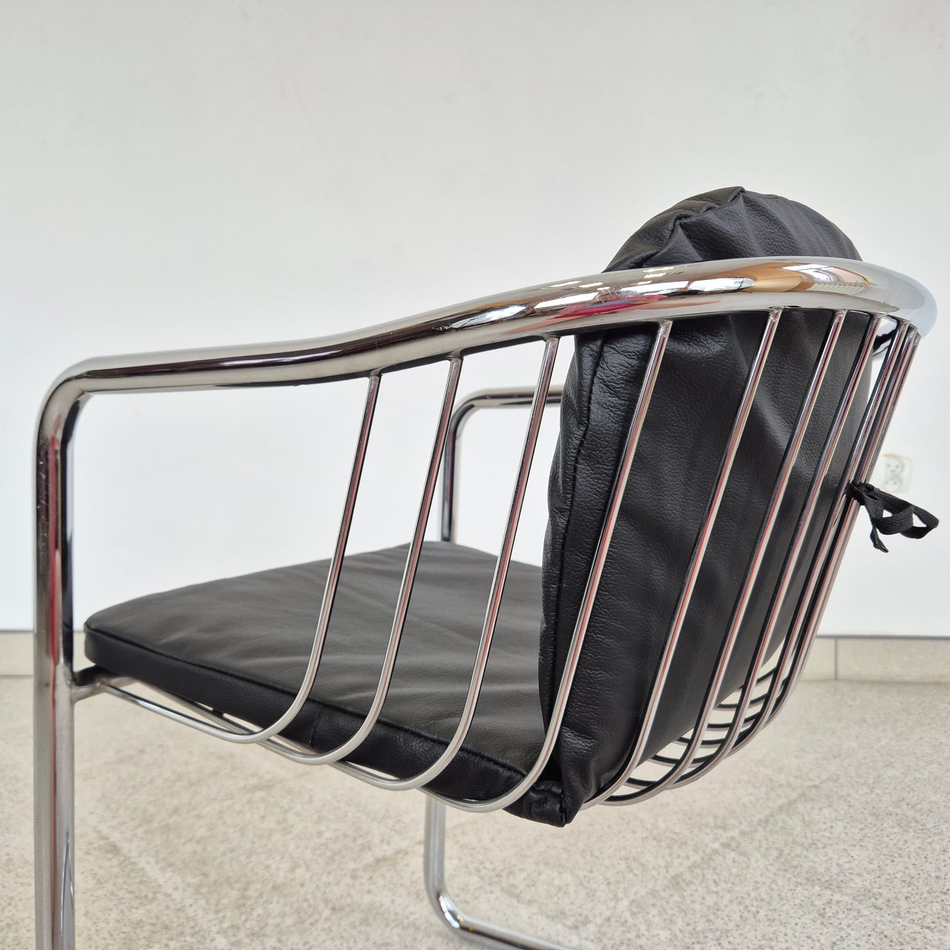 Armchair, black leather, chromed steel, by G. Rinaldi, Italy, 1970s. - 389916